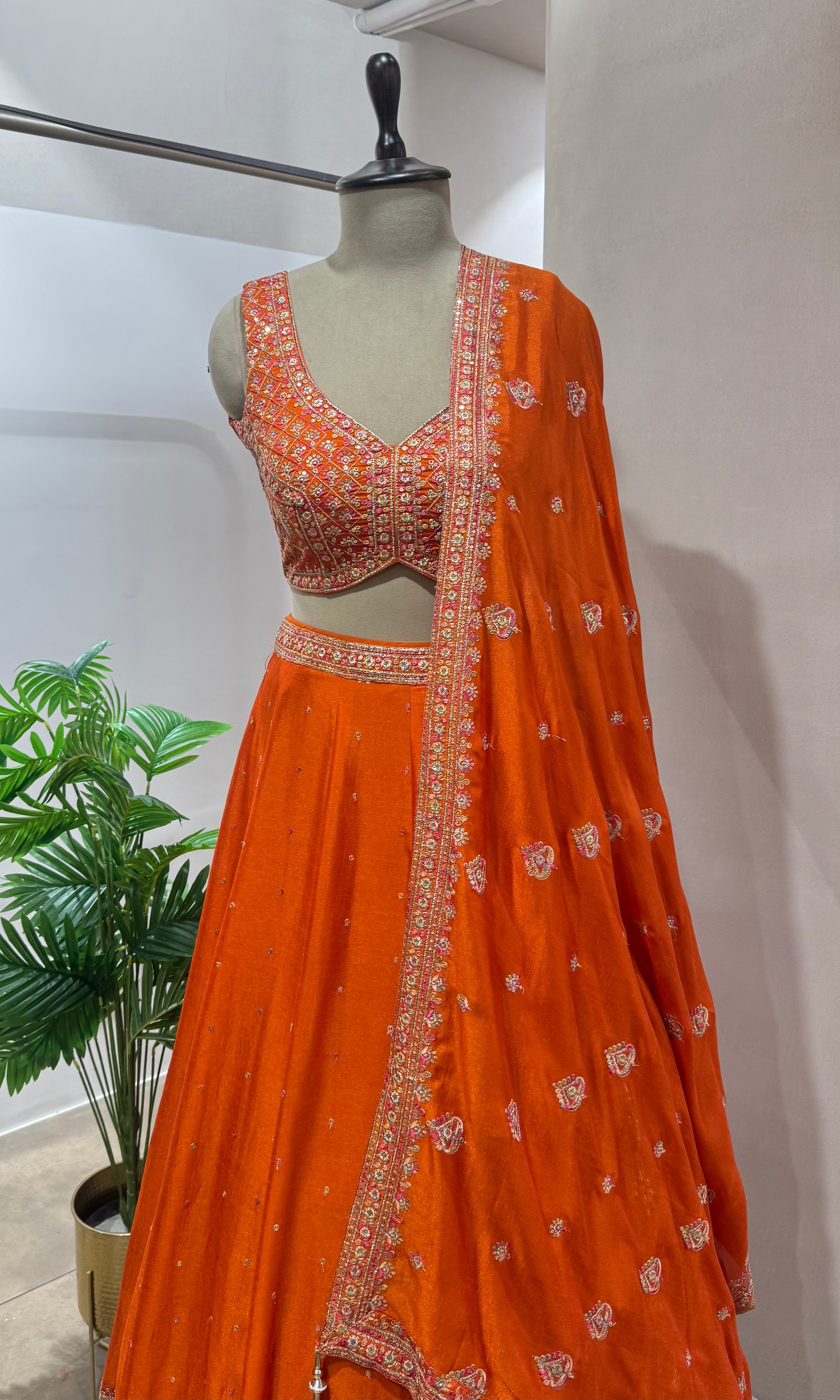 Orange embroidered Lehenga with ethnic dupatta