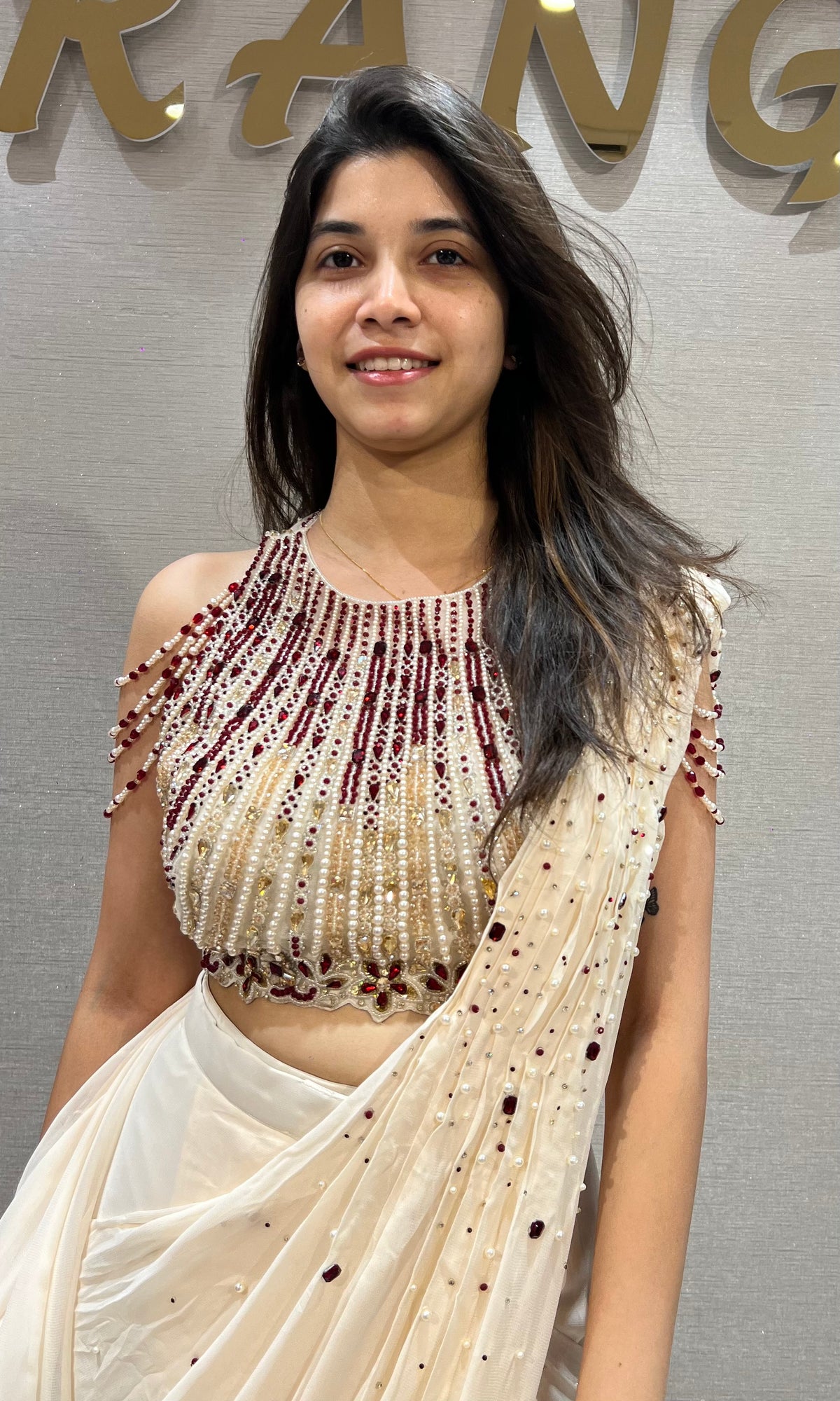 Cream Georgette Saree with Beaded Halter Blouse