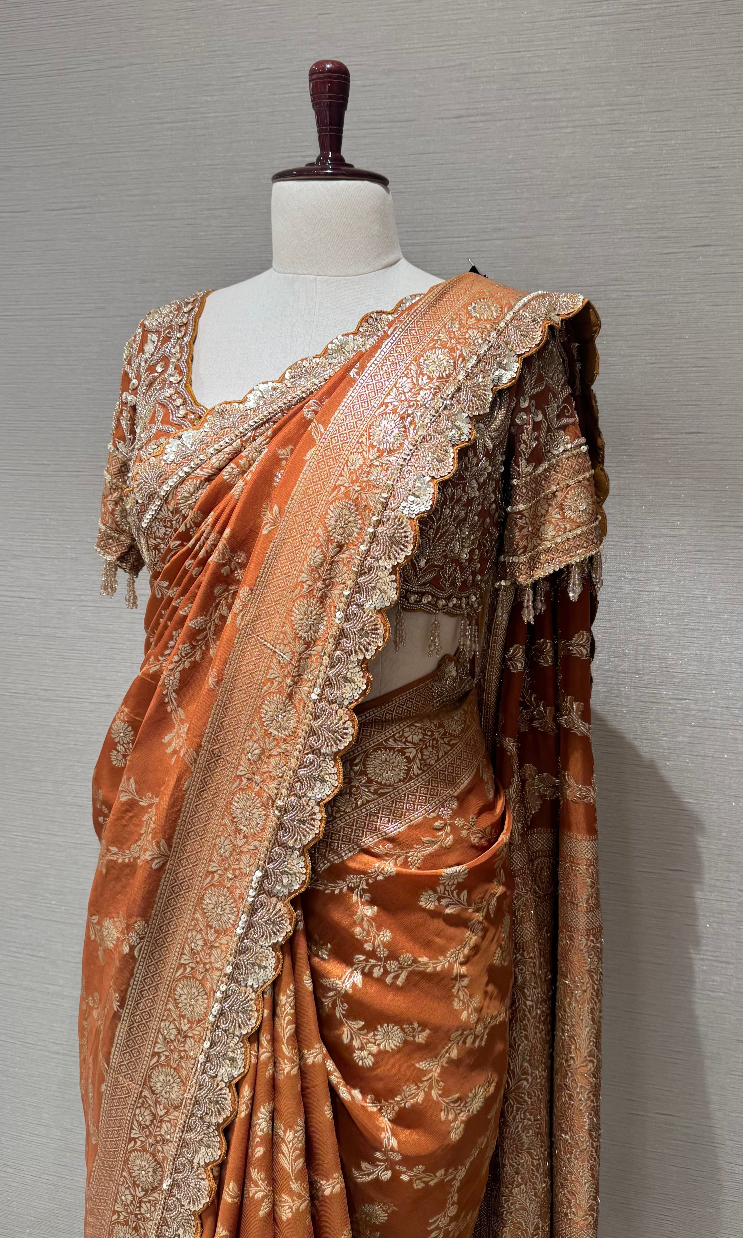 Brown designer saree with embroidered blouse