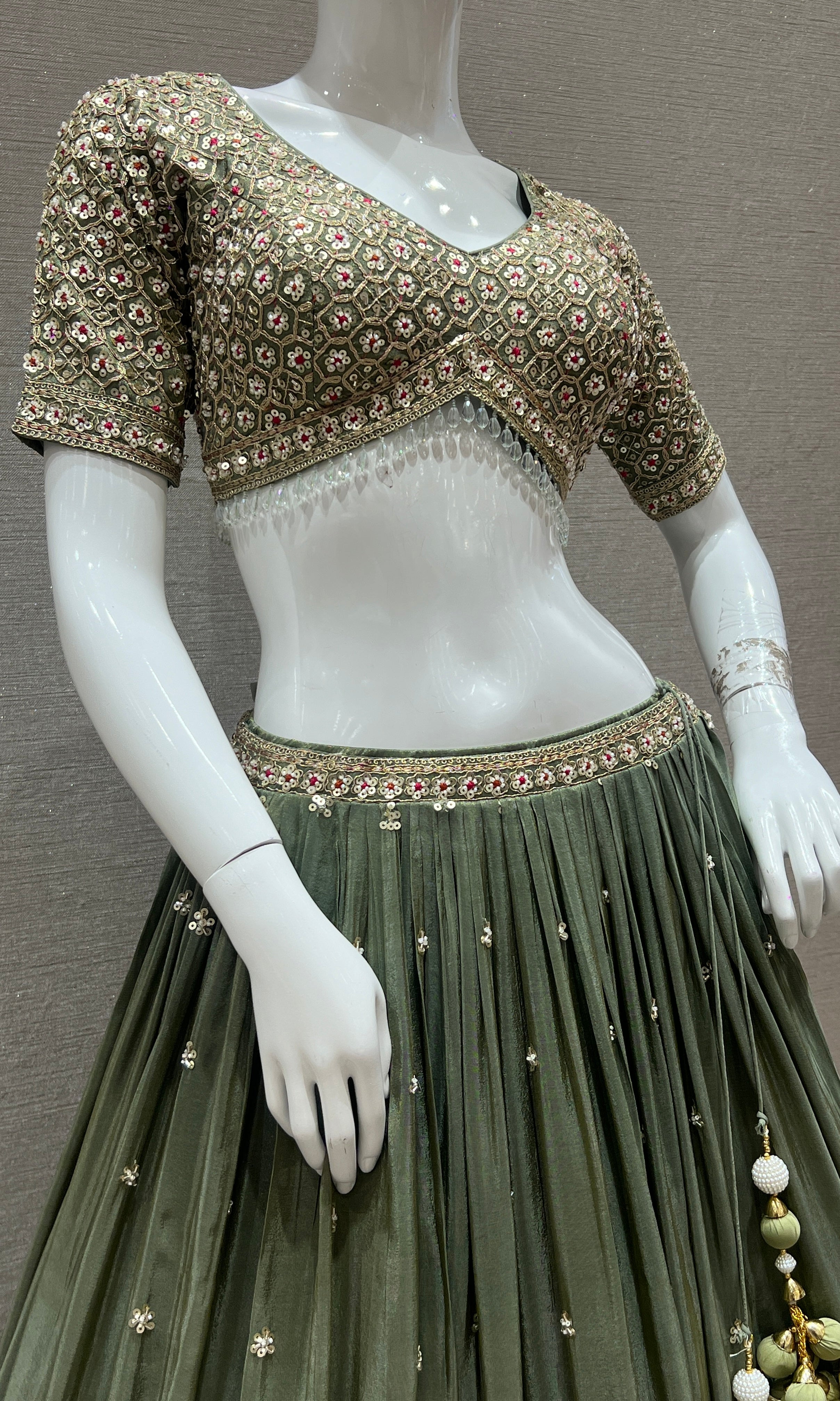 Vanika Sitara - Sage Green Lehenga with Floral & Gold Thread Work Embellishments
