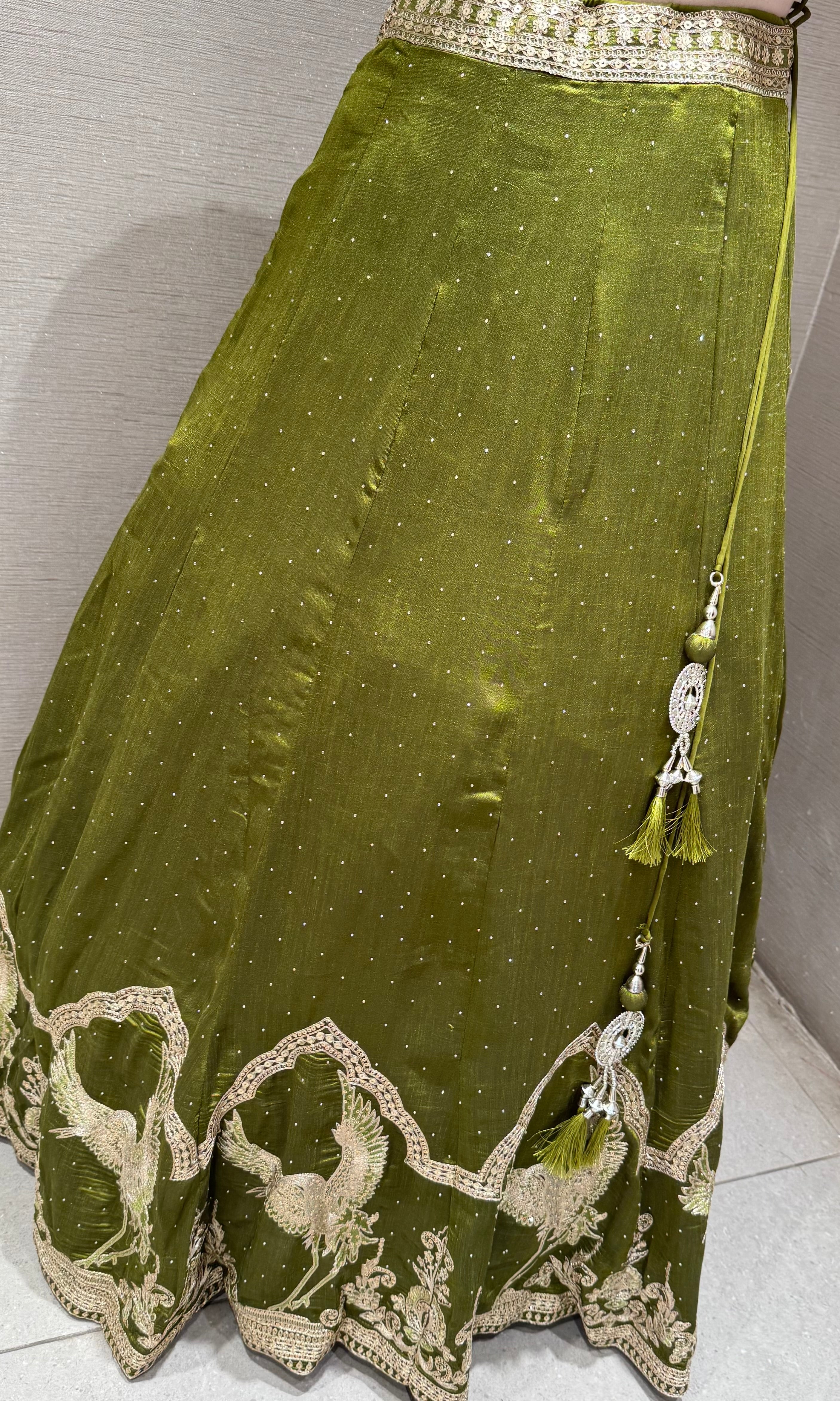 Green Lehenga Choli with Intricate Gold Embroidery
