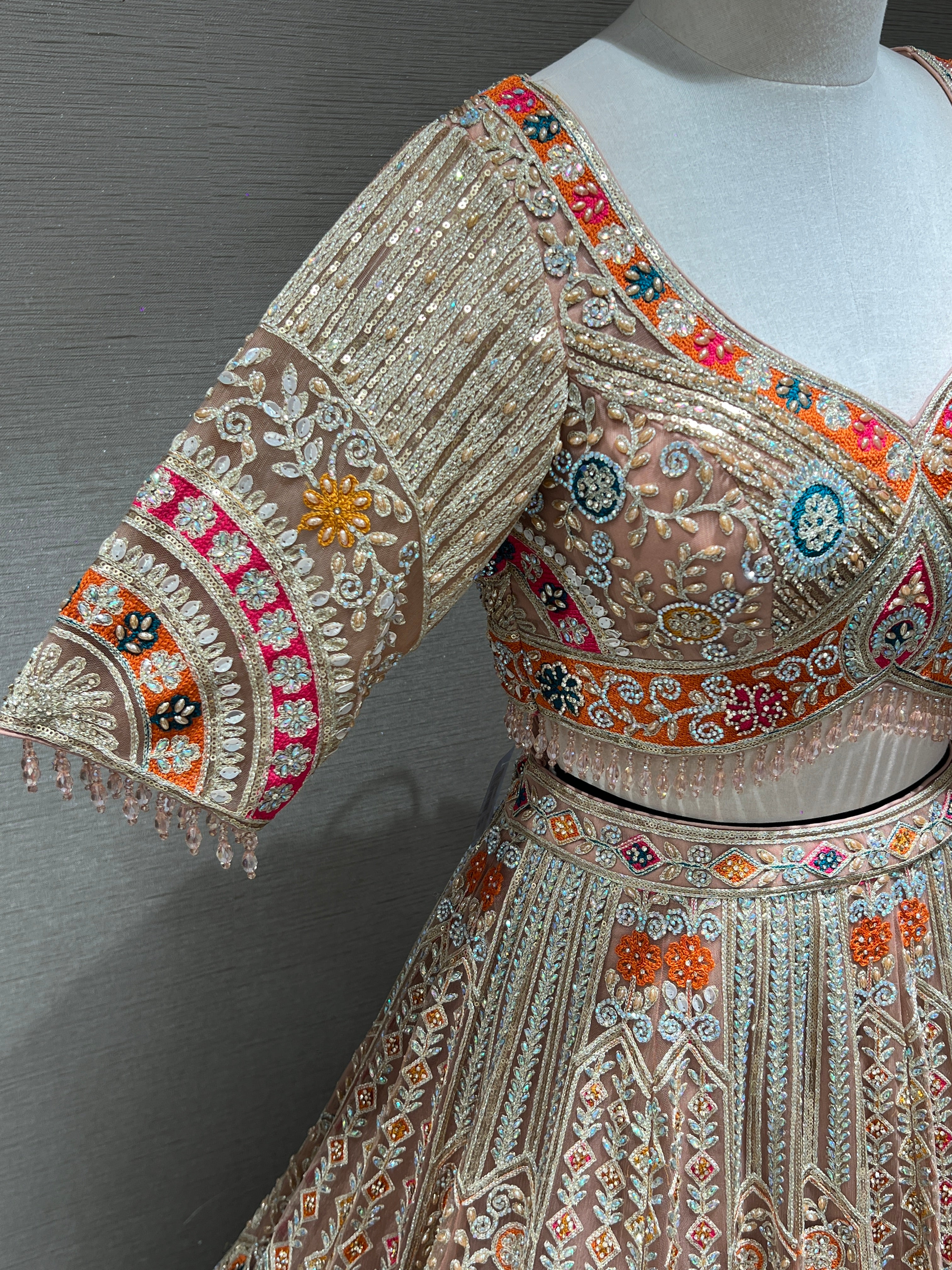 Peach Lehenga with Sequin and stone embellishments