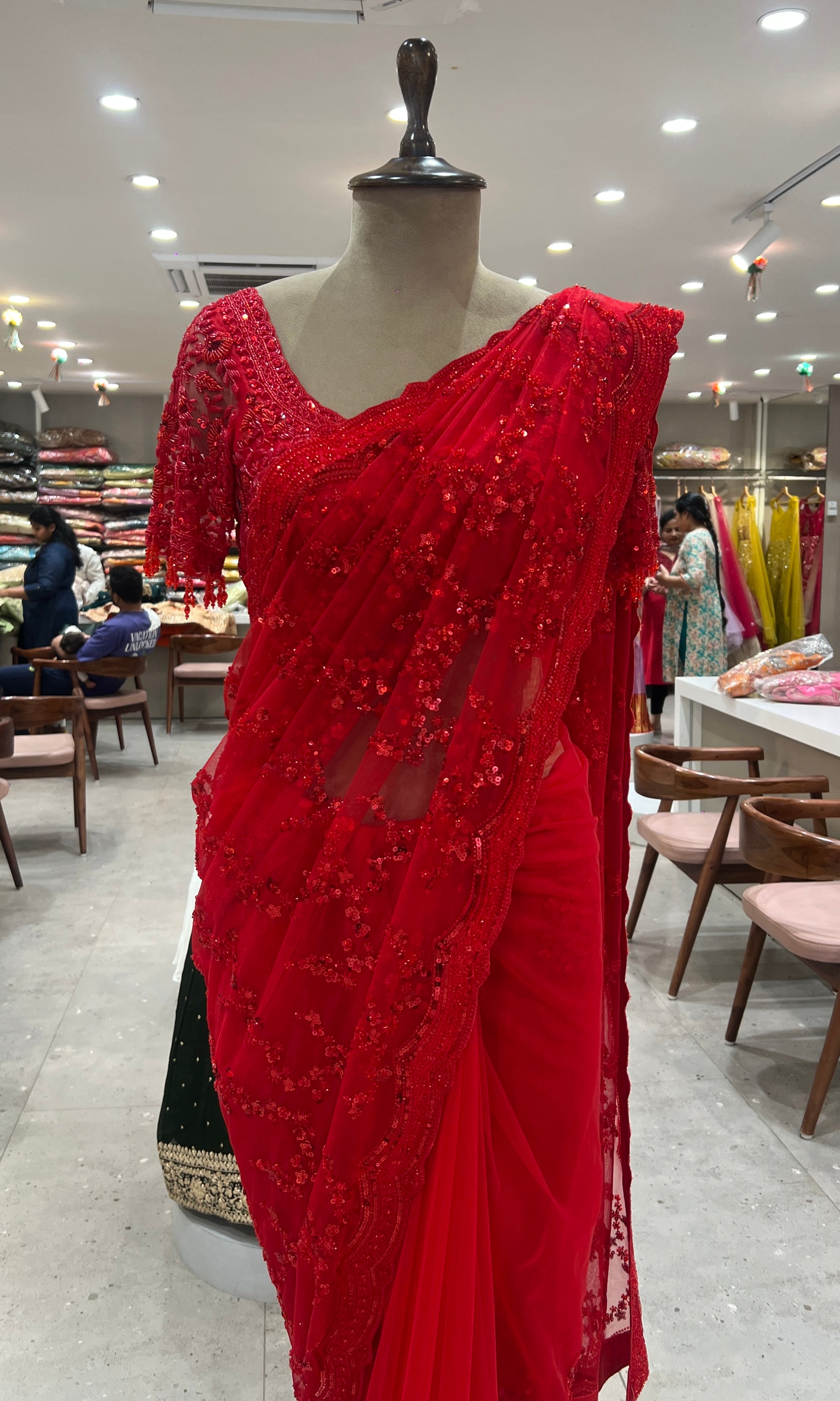 Red designer embellished saree with ready blouse