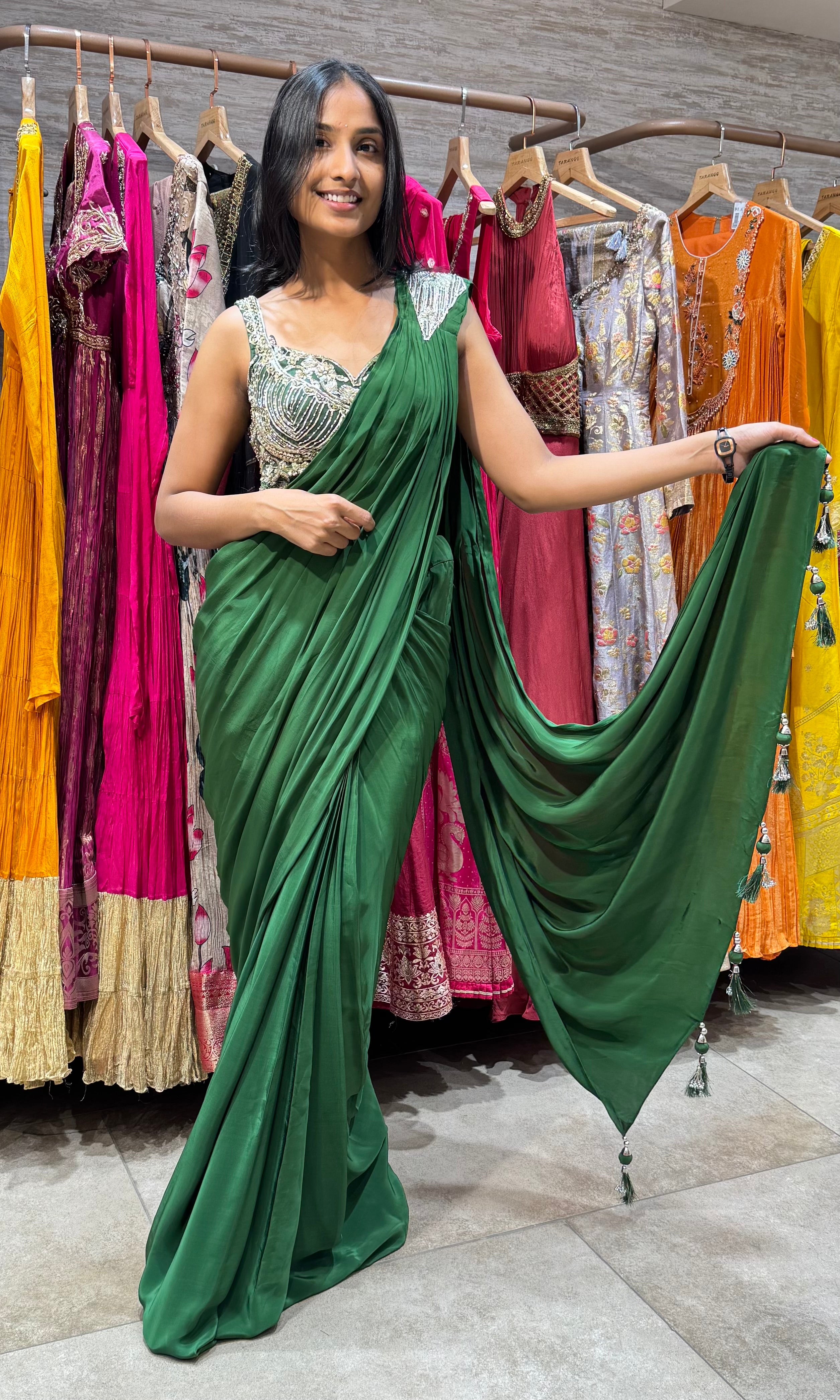GREEN DRAPE SAREE WITH CORSET BLOUSE