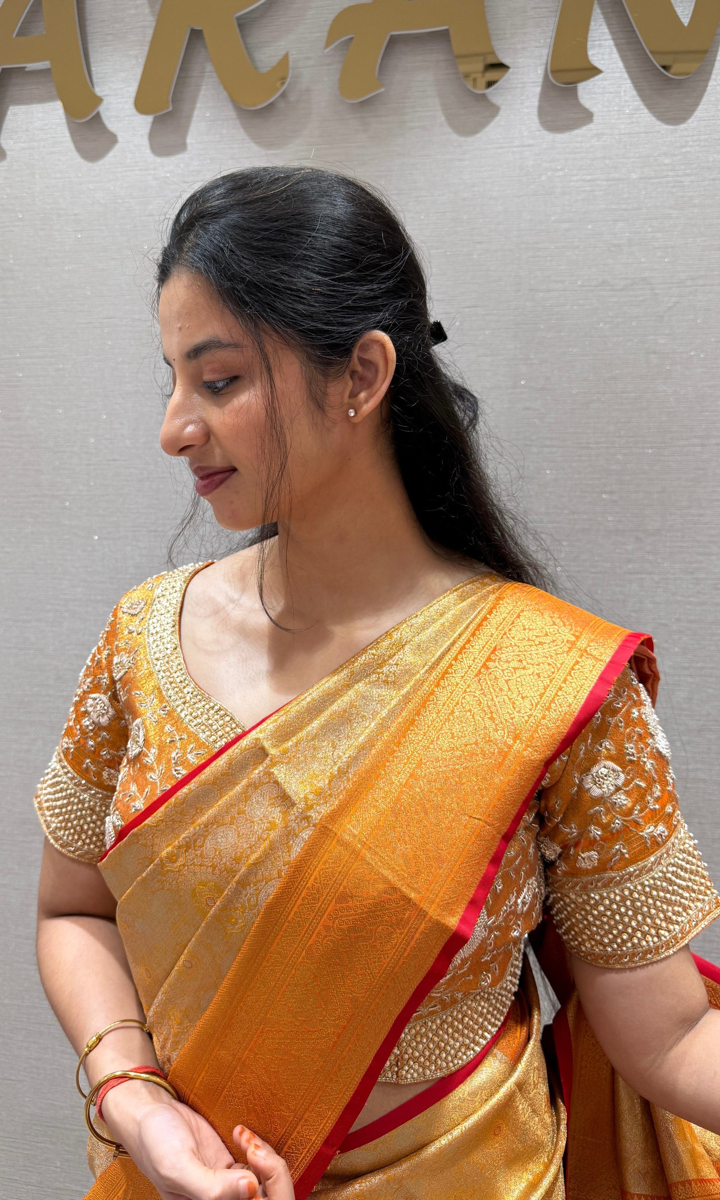 Orange pattu saree with ready blouse