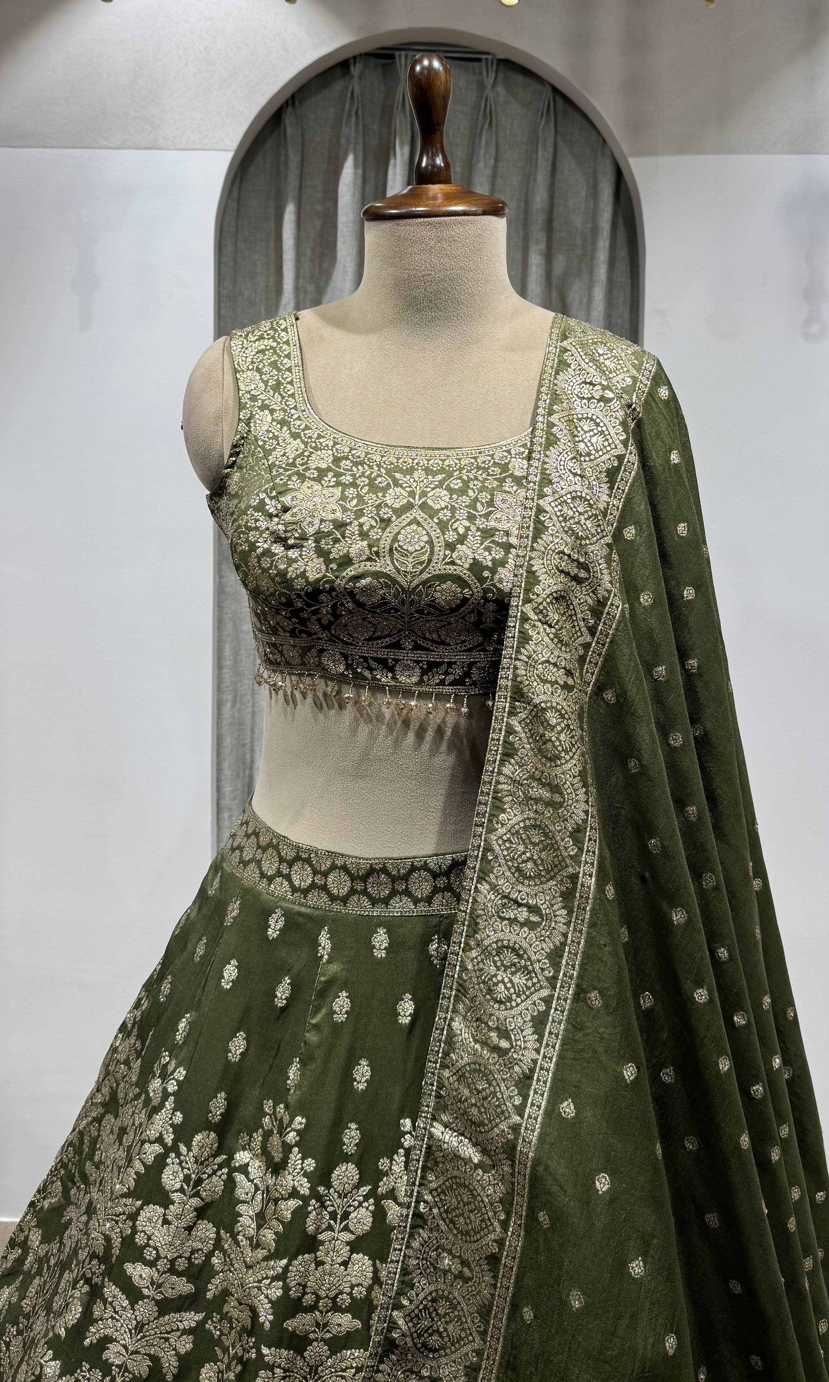 Mehendi Green Net Cord Embroidery Lehenga