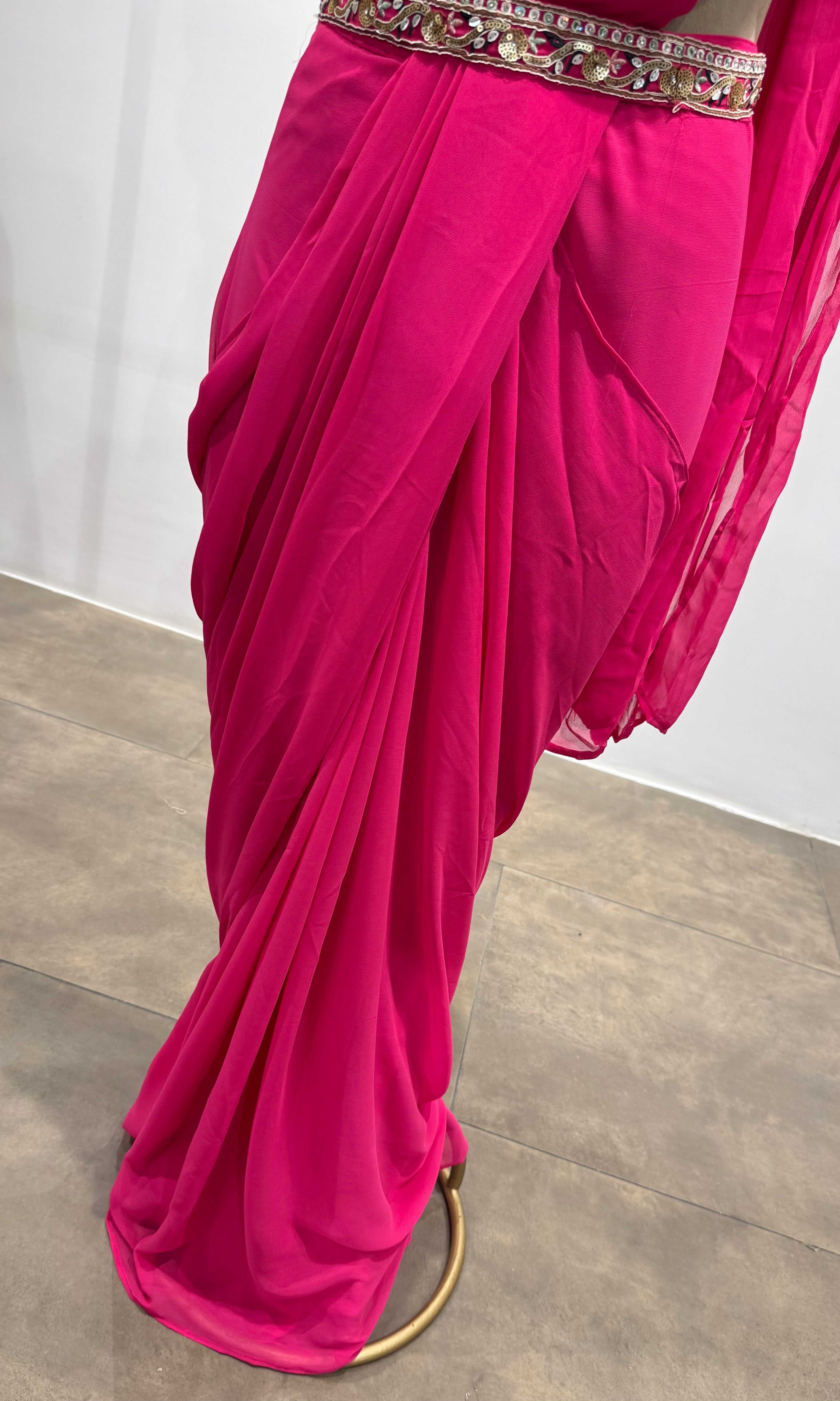 Pink drape saree with floral blouse & belt