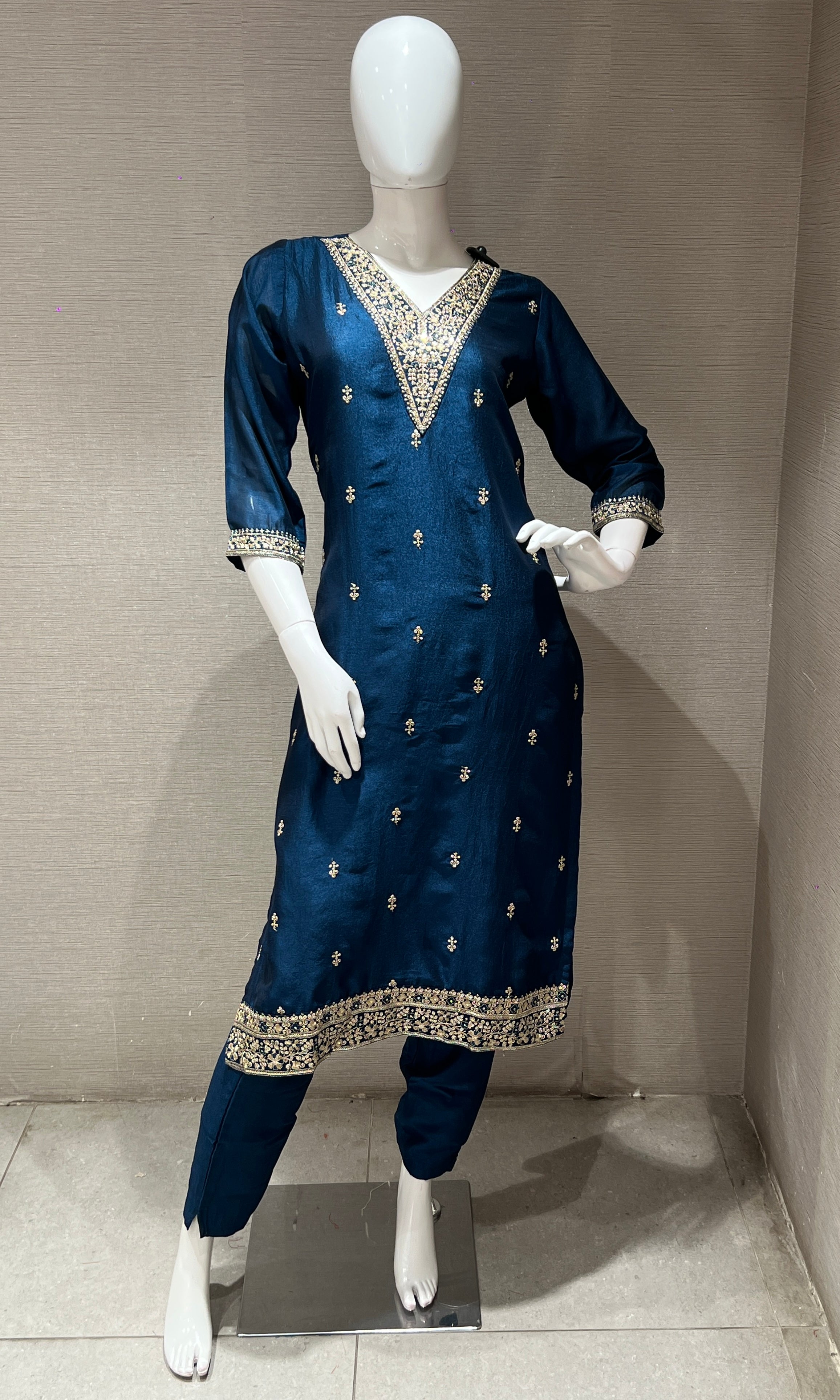 peacock blue kurta set with gold duppatta
