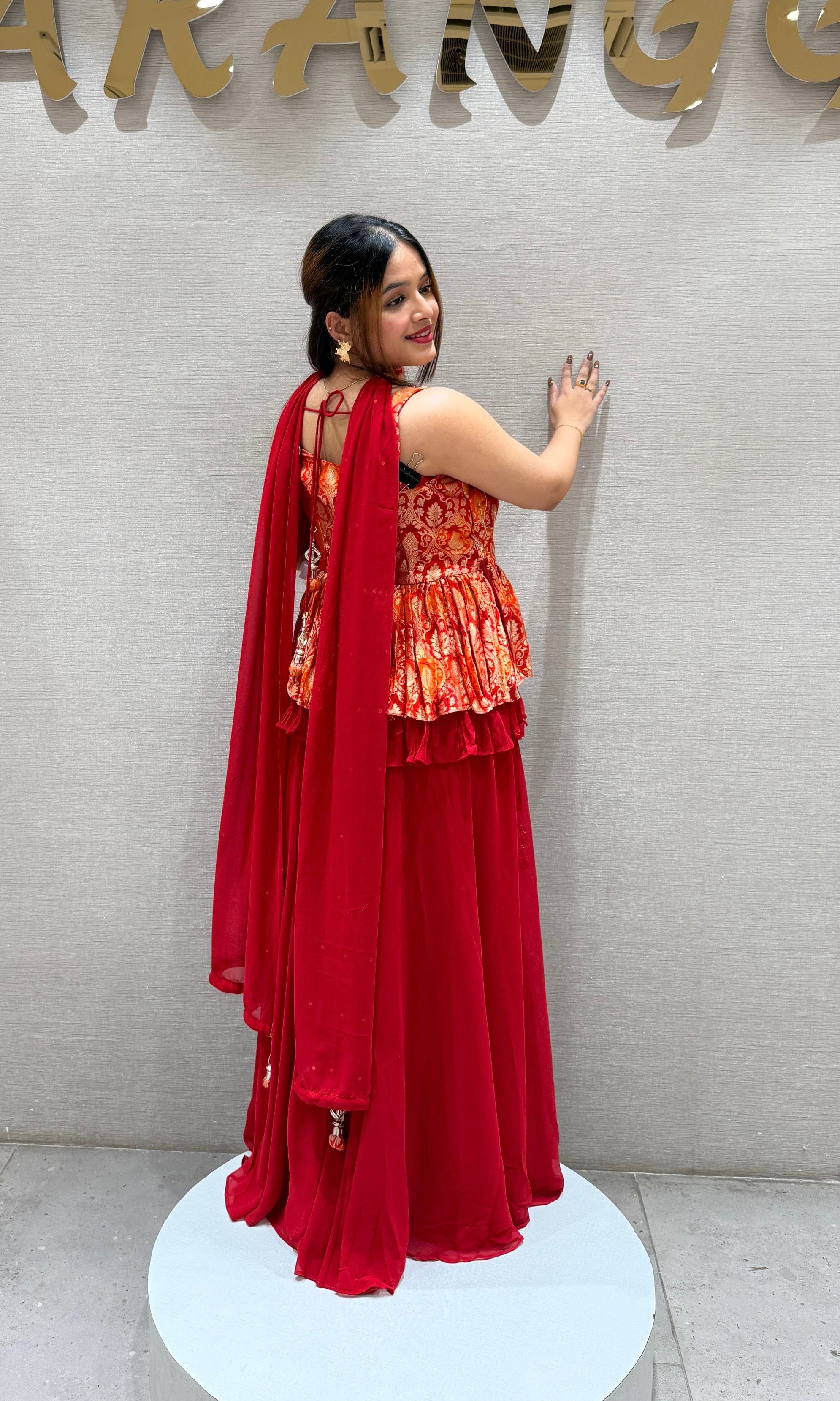 Red palazzo set with peplum top