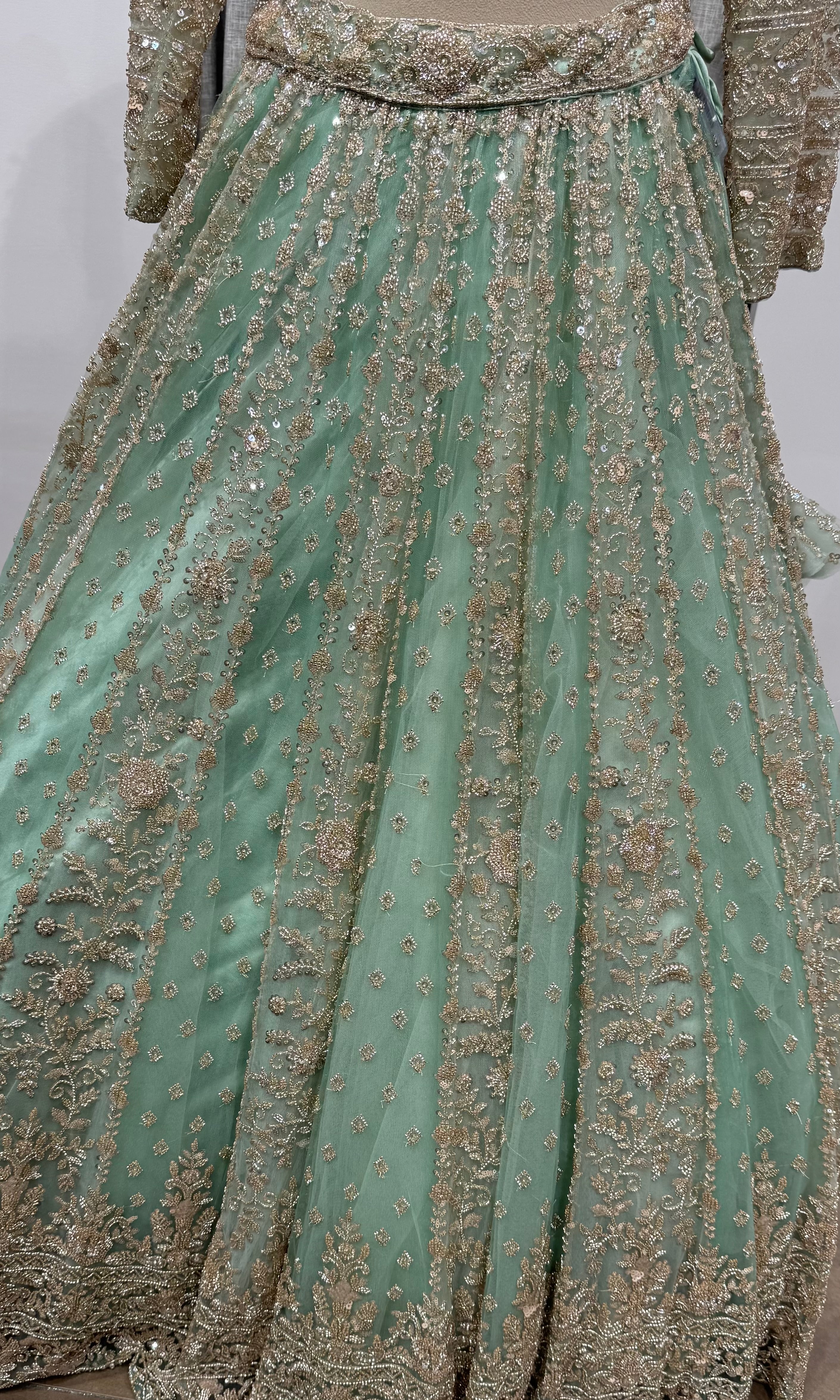 Pista Green Bridal Lehenga with Shimmering Border
