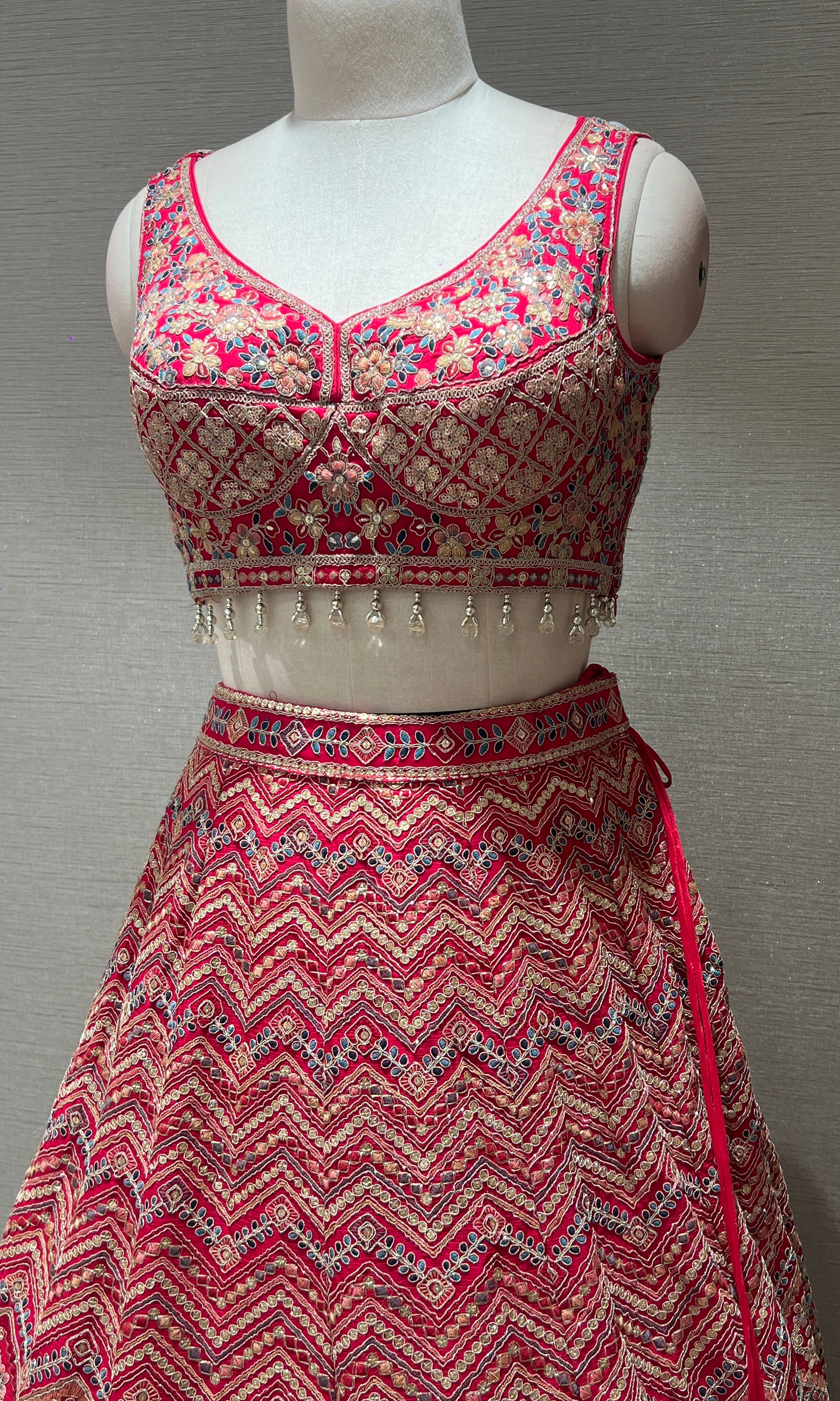 lotus pink lehenga with intricate embroidery