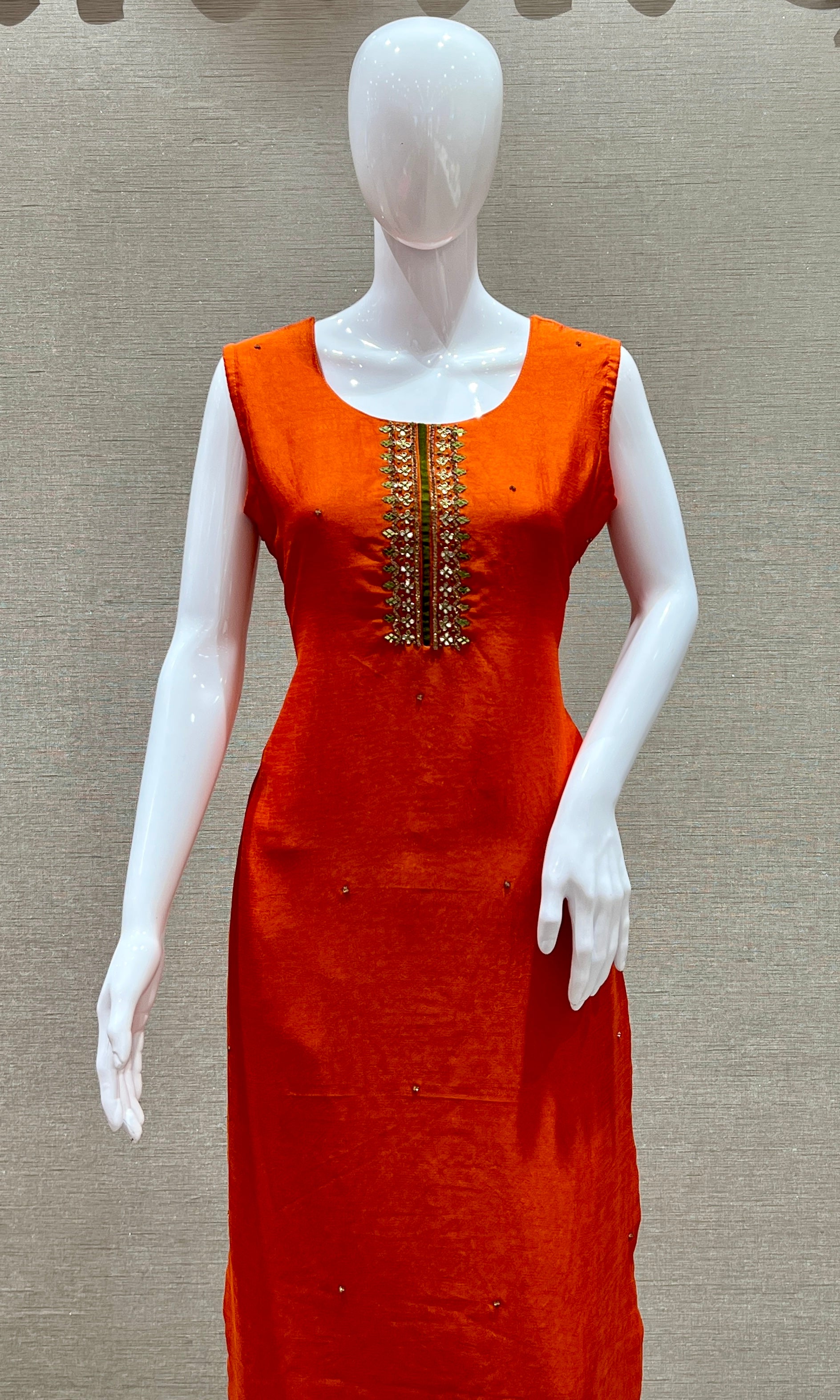 Orange kurta set with green Contrast dupatta