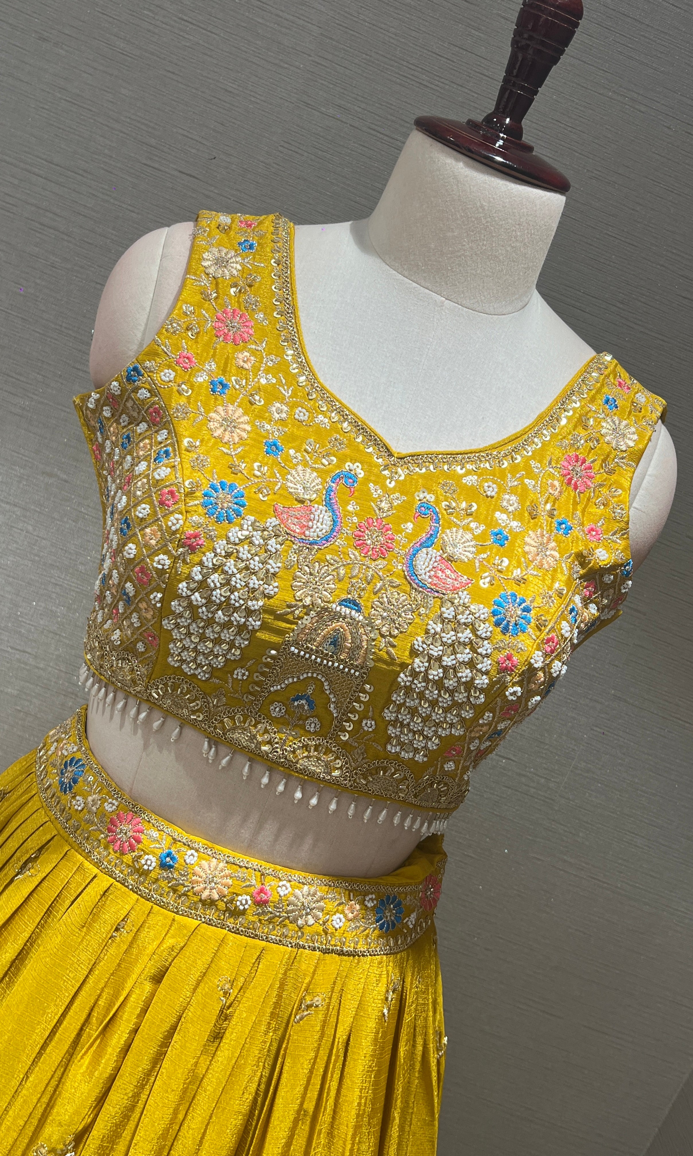 Yellow peacock embroidered Lehenga