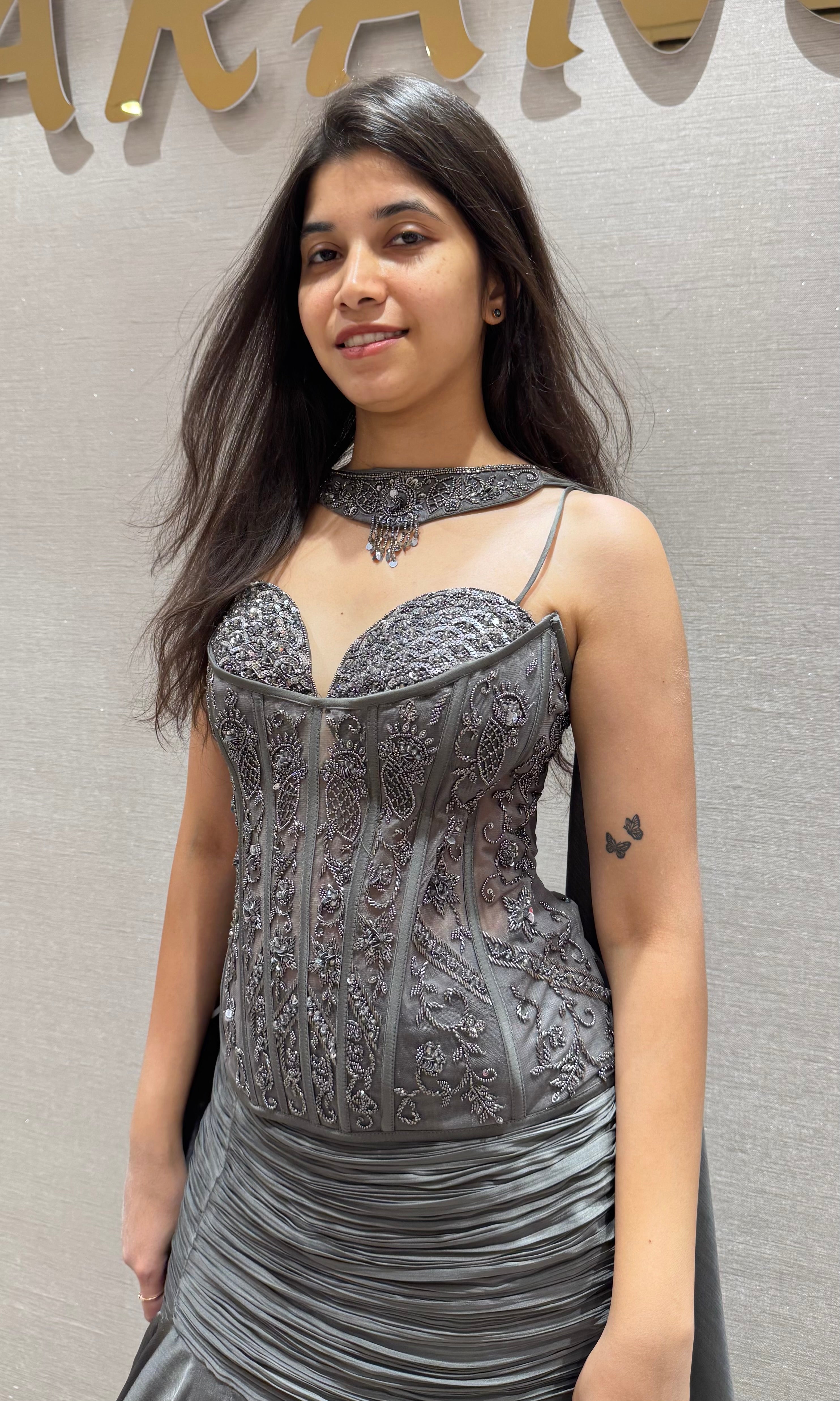 Grey ruffled lehenga with corset blouse