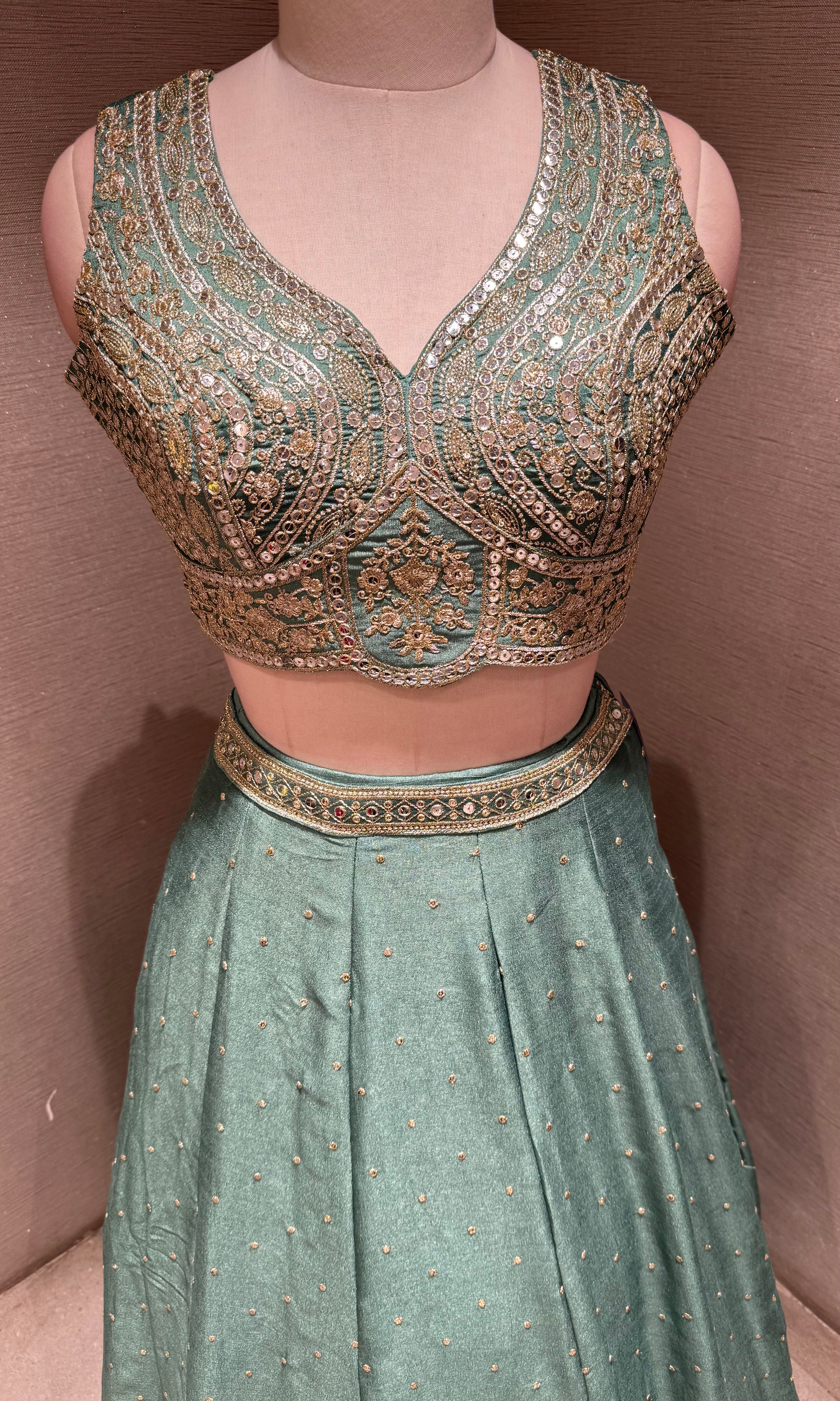 Green Flared Lehenga Choli with Heavy Gold Embroidery