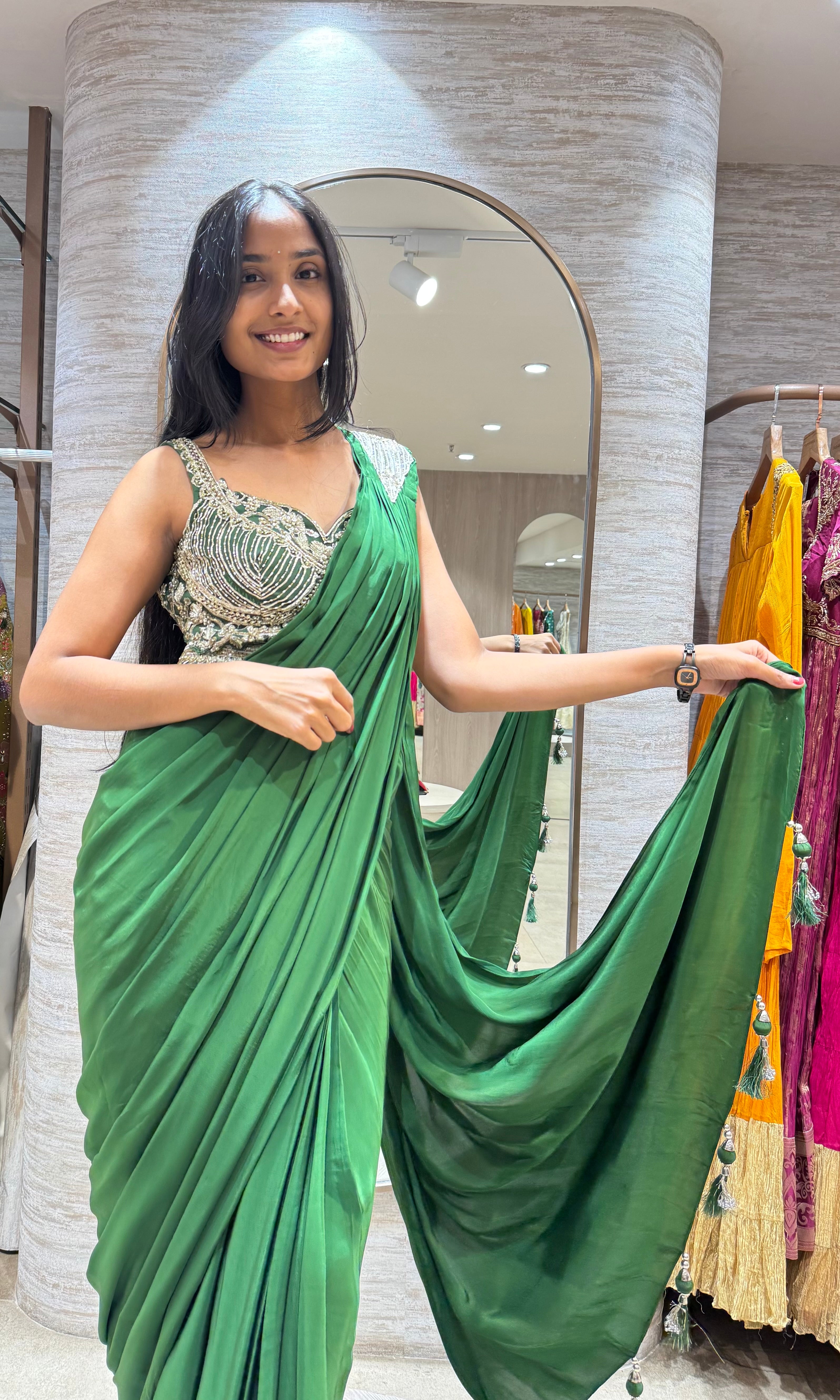 GREEN DRAPE SAREE WITH CORSET BLOUSE