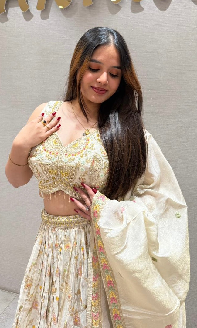 Pearl white lehenga with gold embroidered