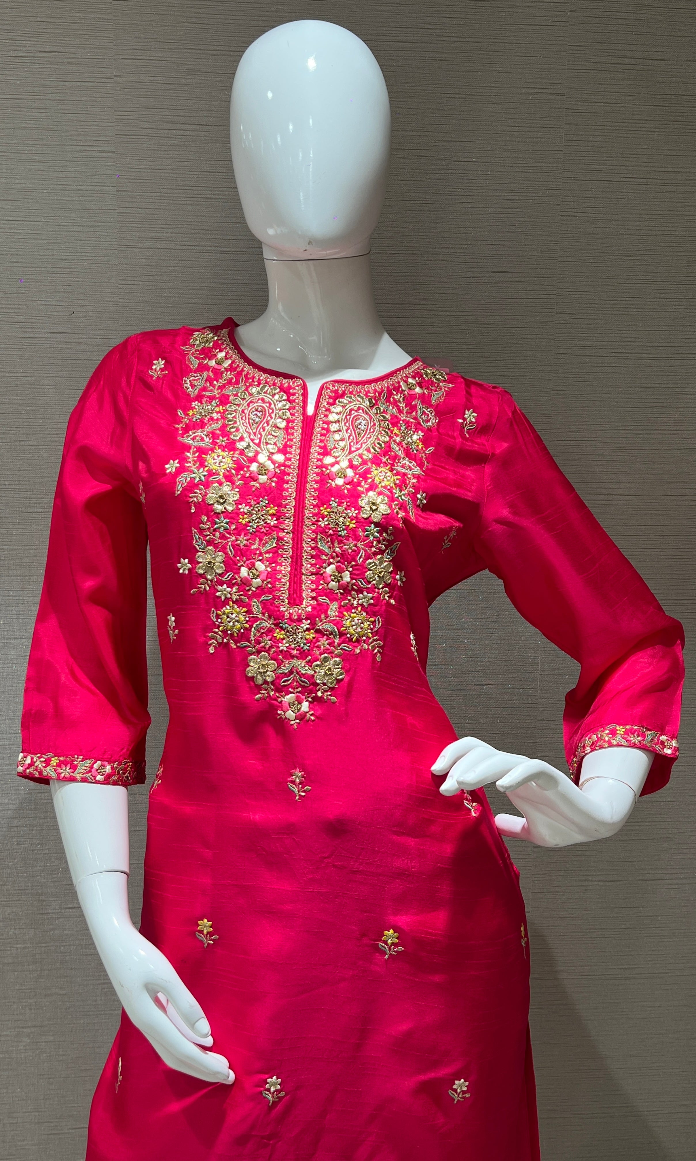 Pink kurta set with a yellow dupatta