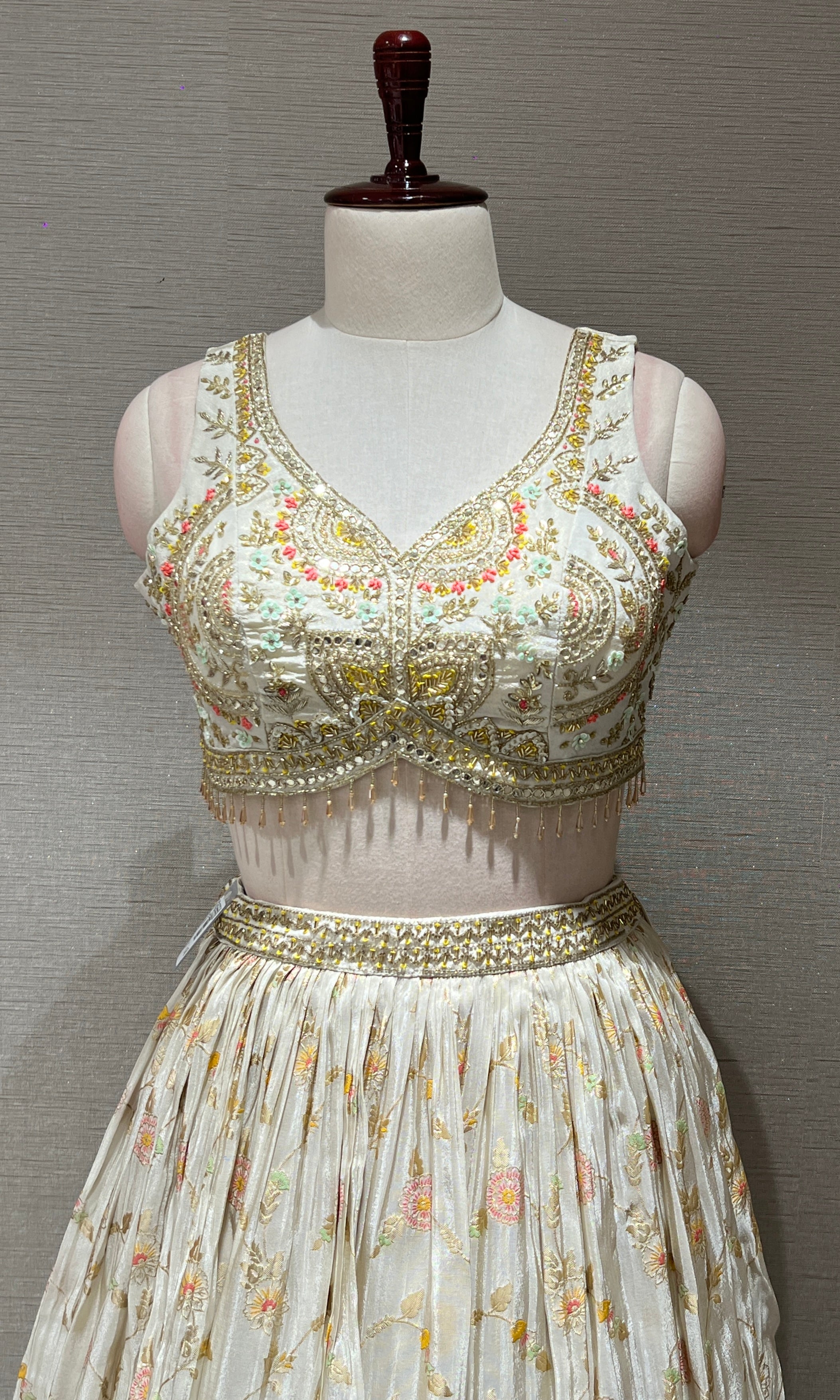 Half white Floral embroidred Lehenga with Golden Border