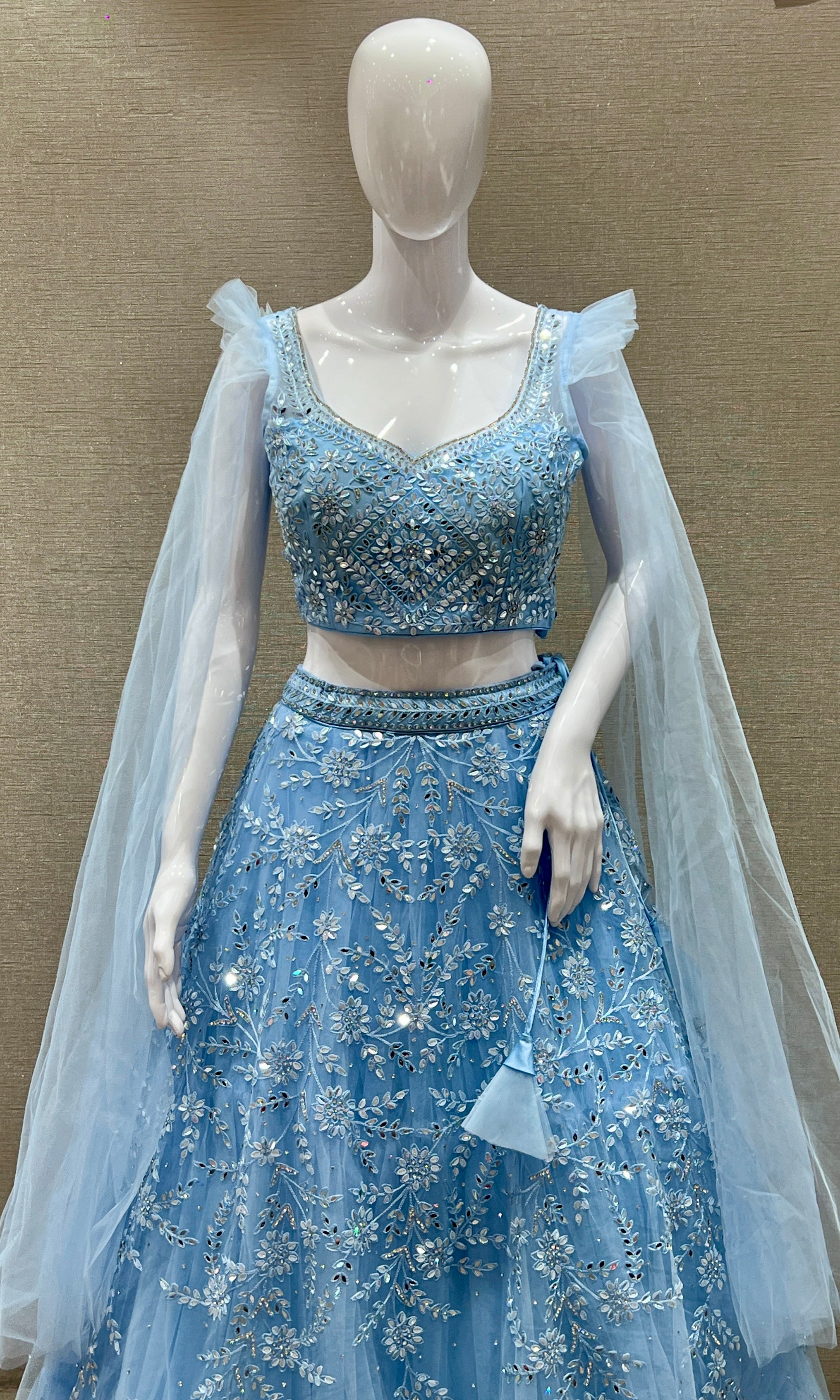 Aarvi β Sky Blue Net Embroidered Lehenga Set