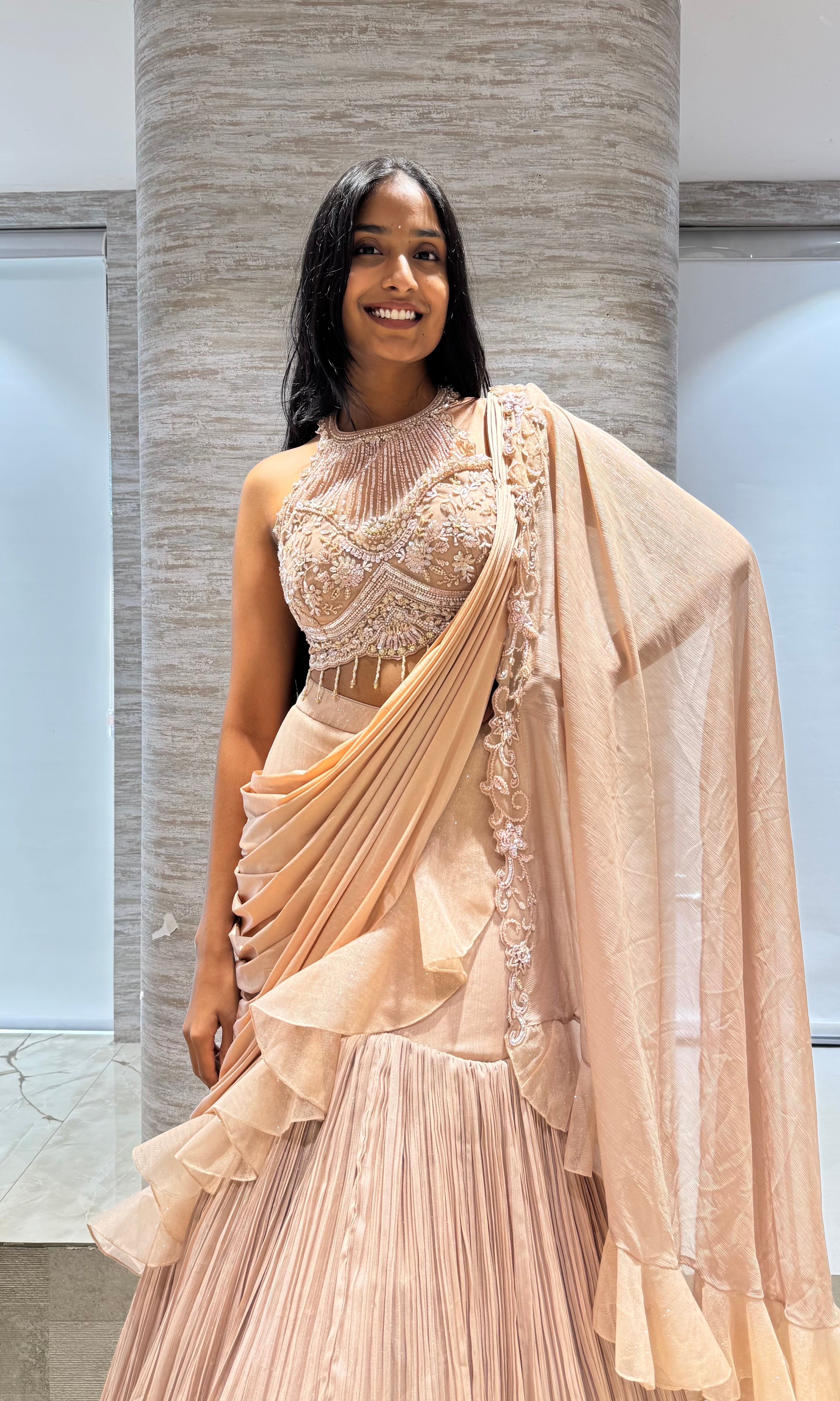 GOLD RUFFLE LEHENGA WITH HALTER NECK BLOUSE