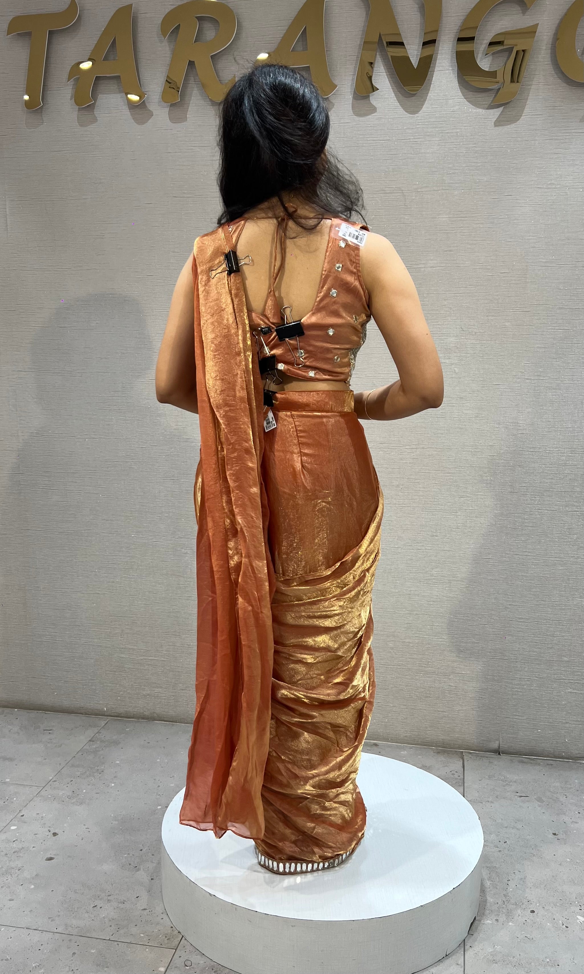 Rust Shimmer Drape Saree with mirror embellished blouse
