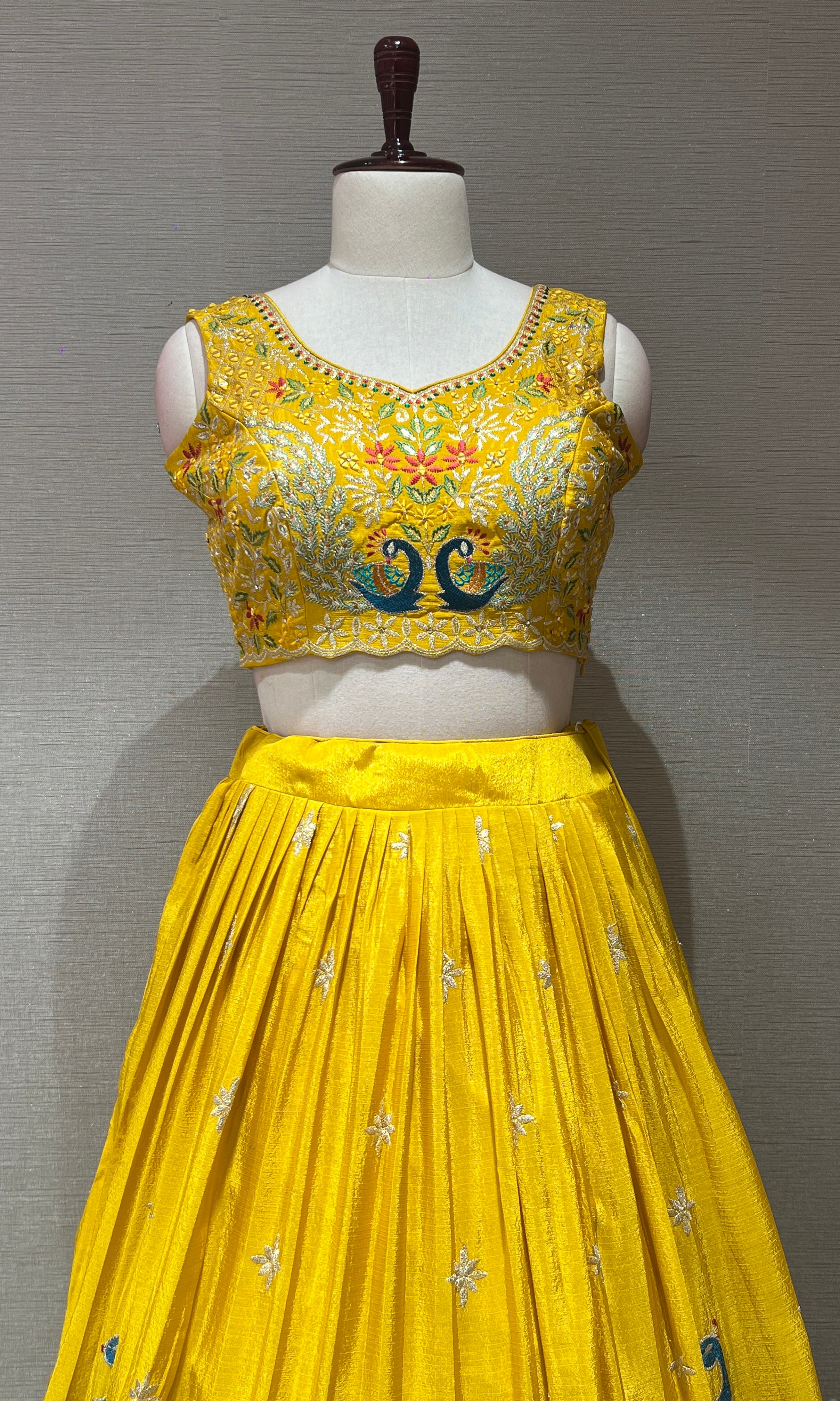 yellow lehenga with peacock design