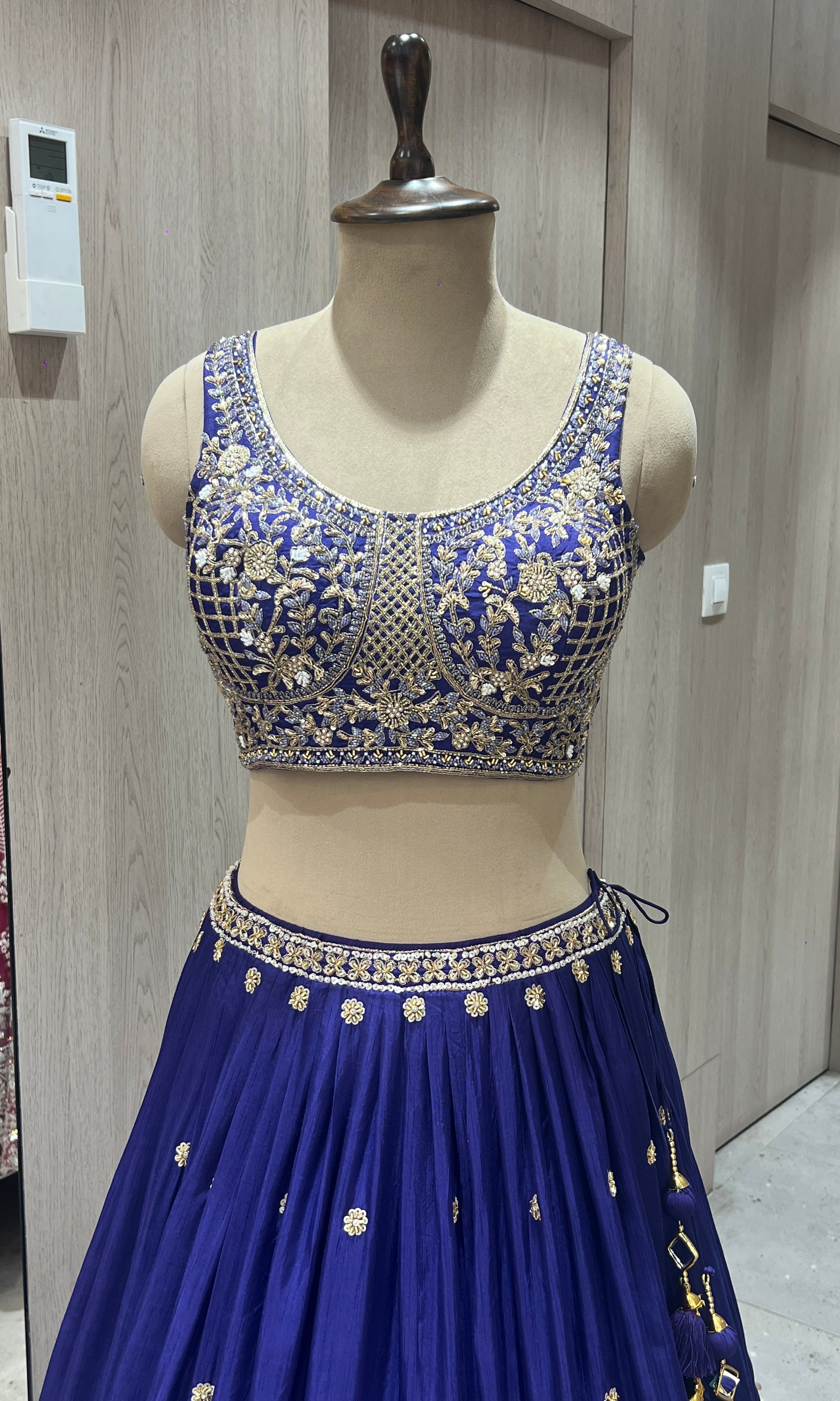 Purple lehenga with gold embroidered work