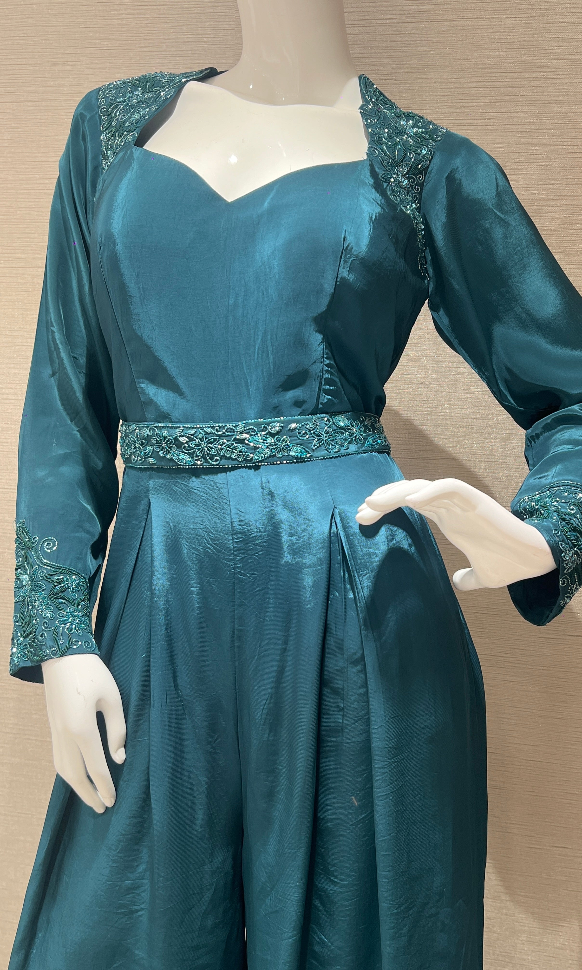 Green jumpsuit with belt
