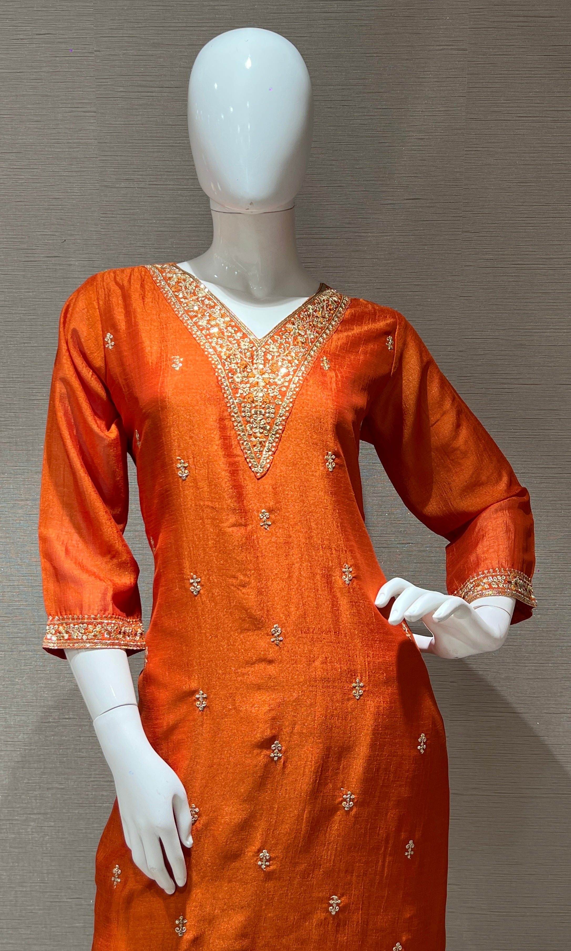 orange kurta set with contrast gold duppatta