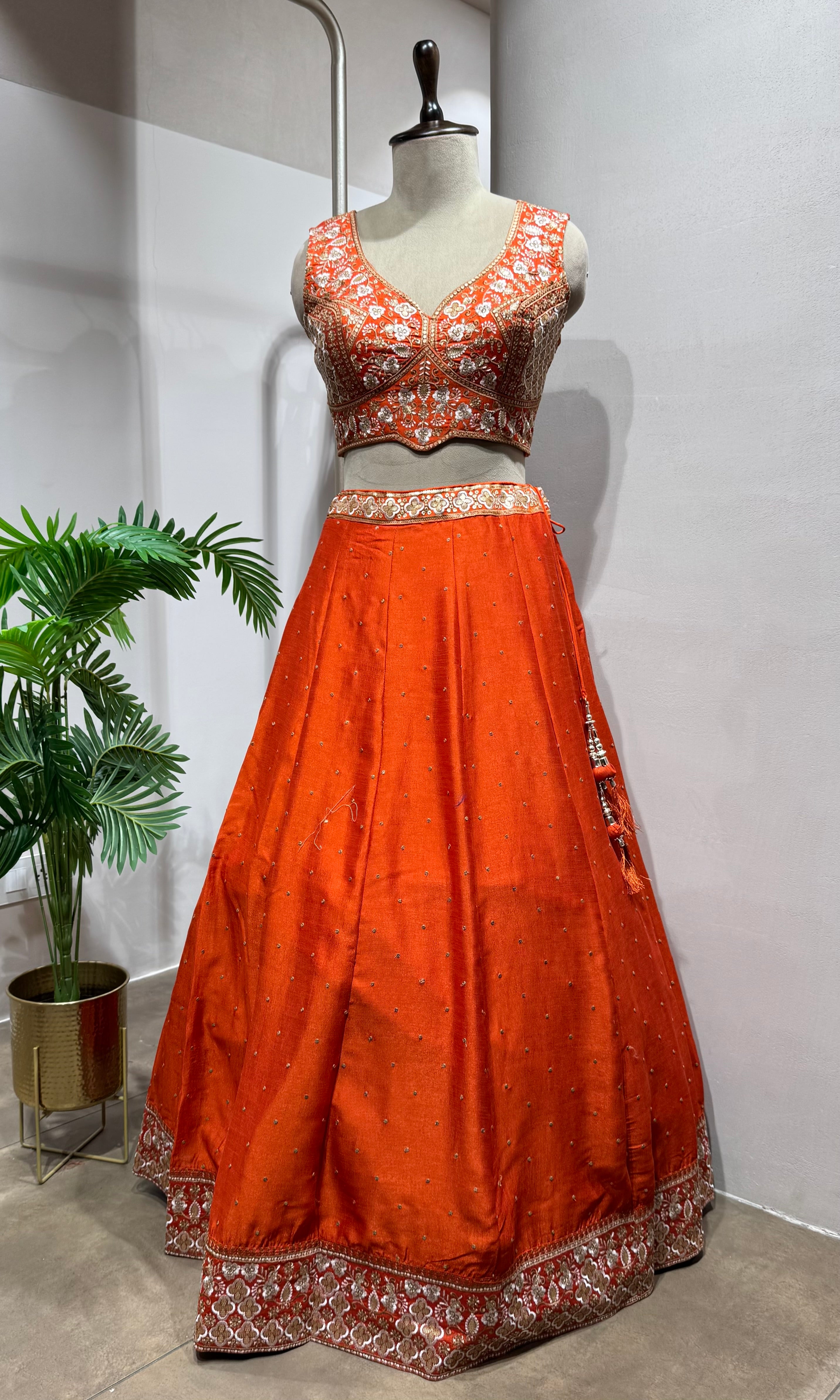 Orange golden embroidery lehenga set