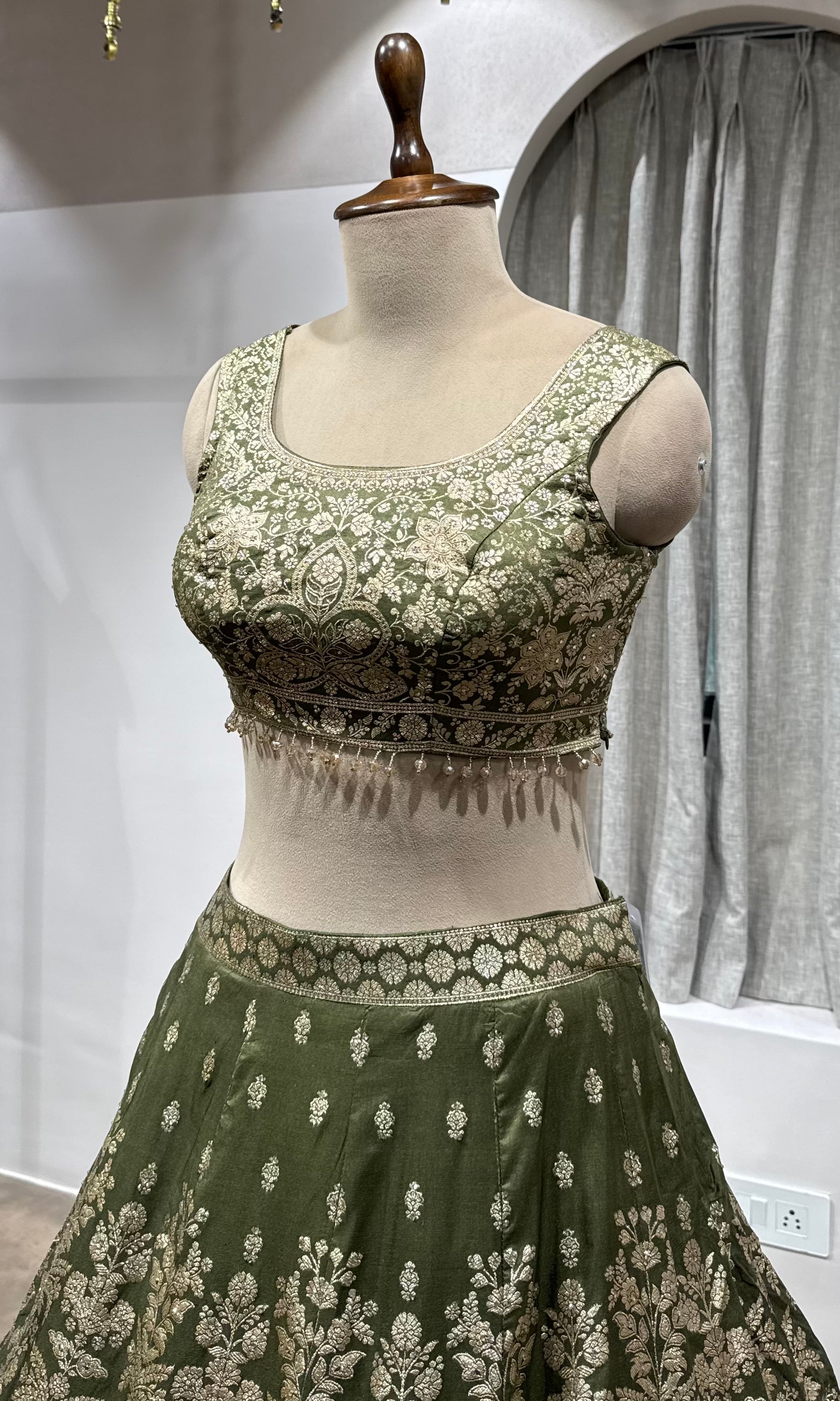 Mehendi Green Net Cord Embroidery Lehenga
