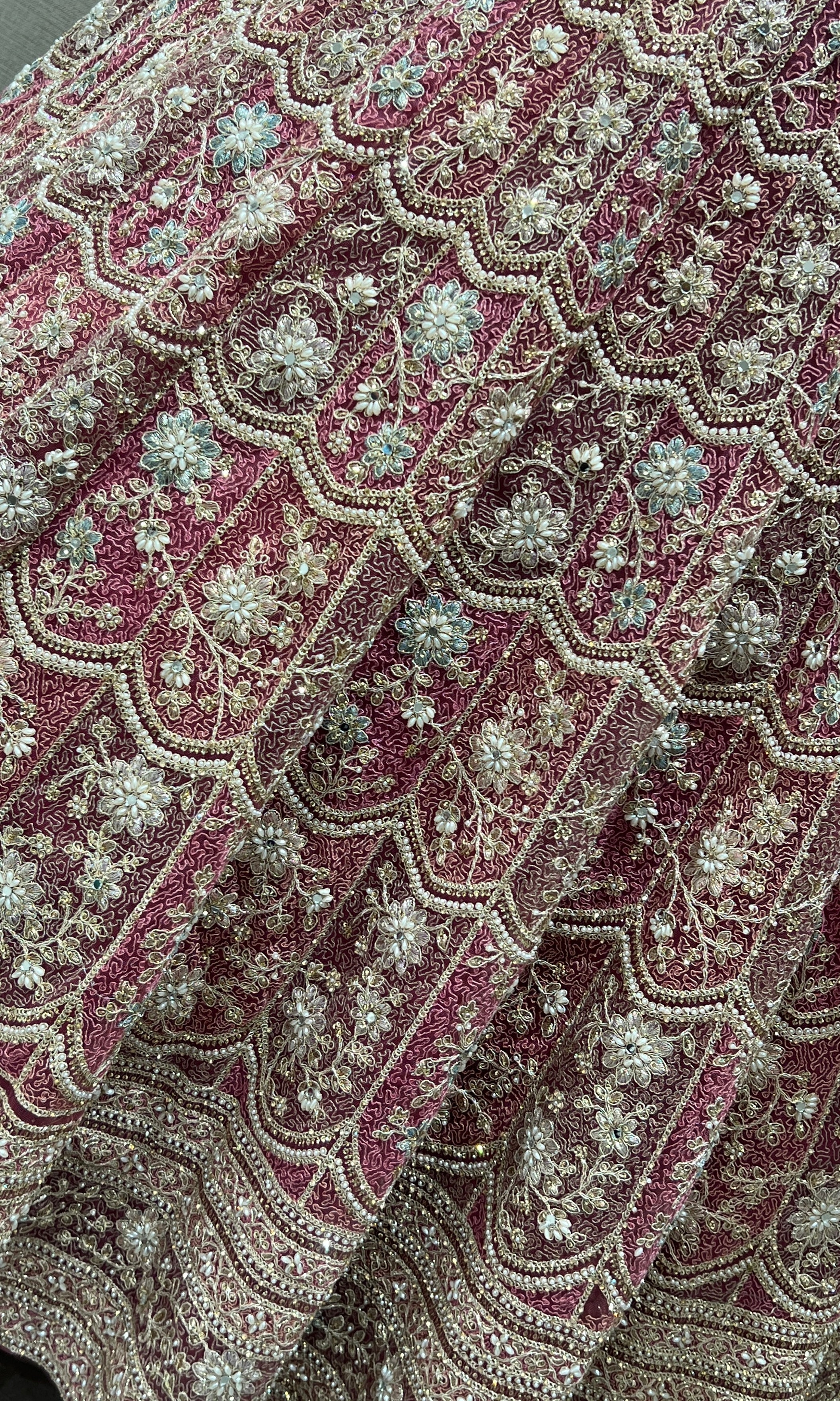 Pink lehenga with intricate embroidery and zari work