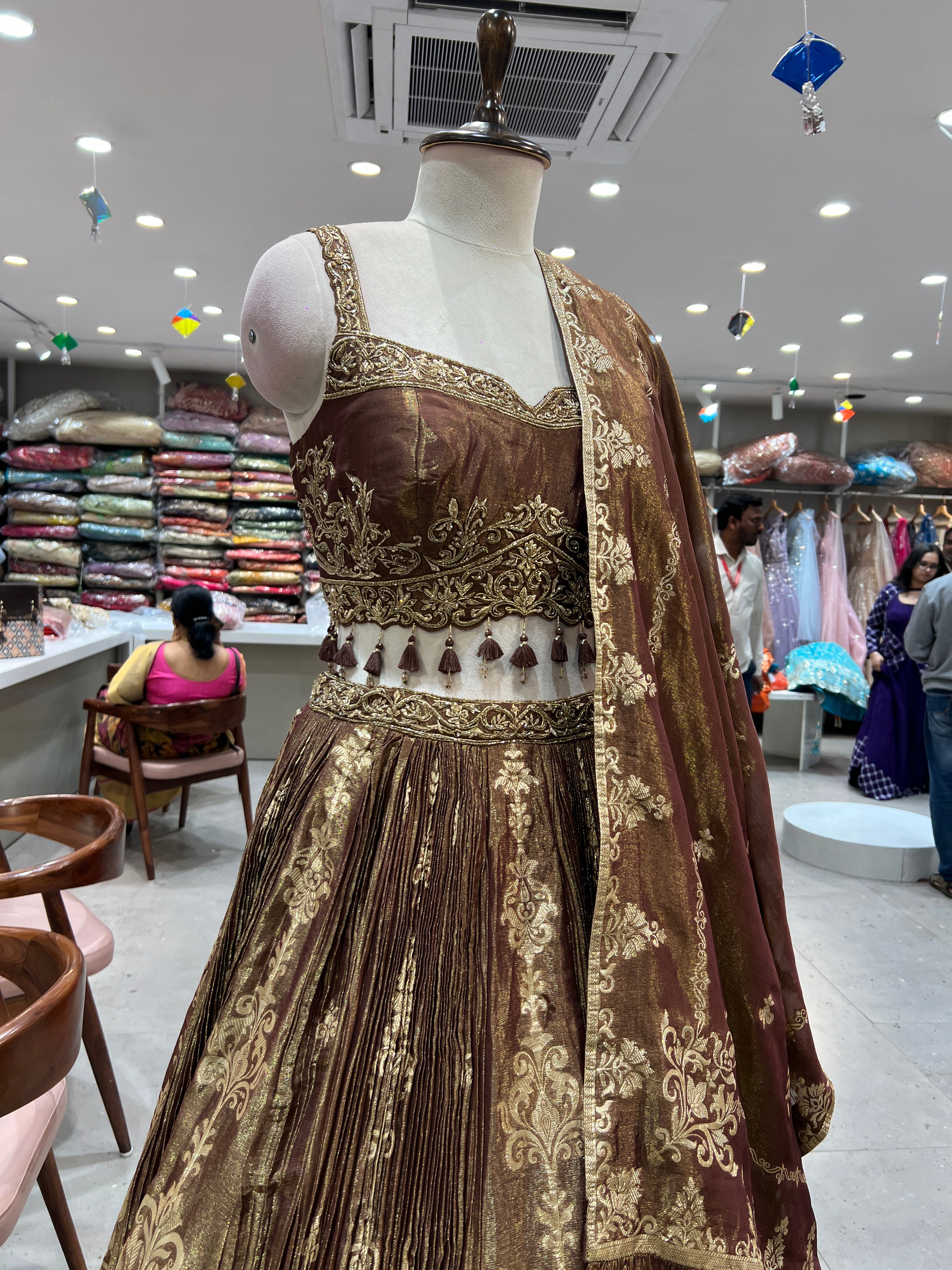 brown lehenga with gold embroidery