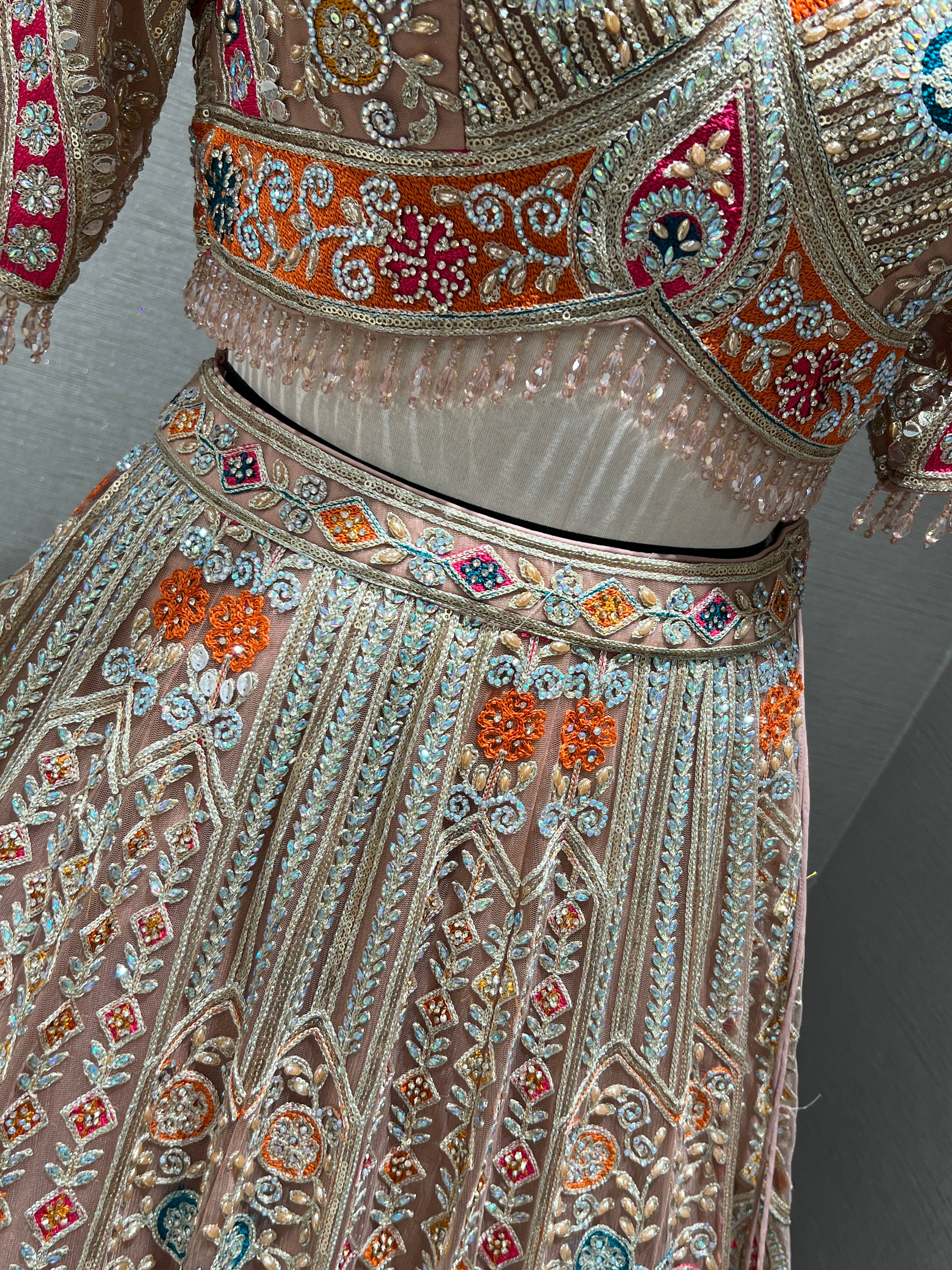Peach Lehenga with Sequin and stone embellishments