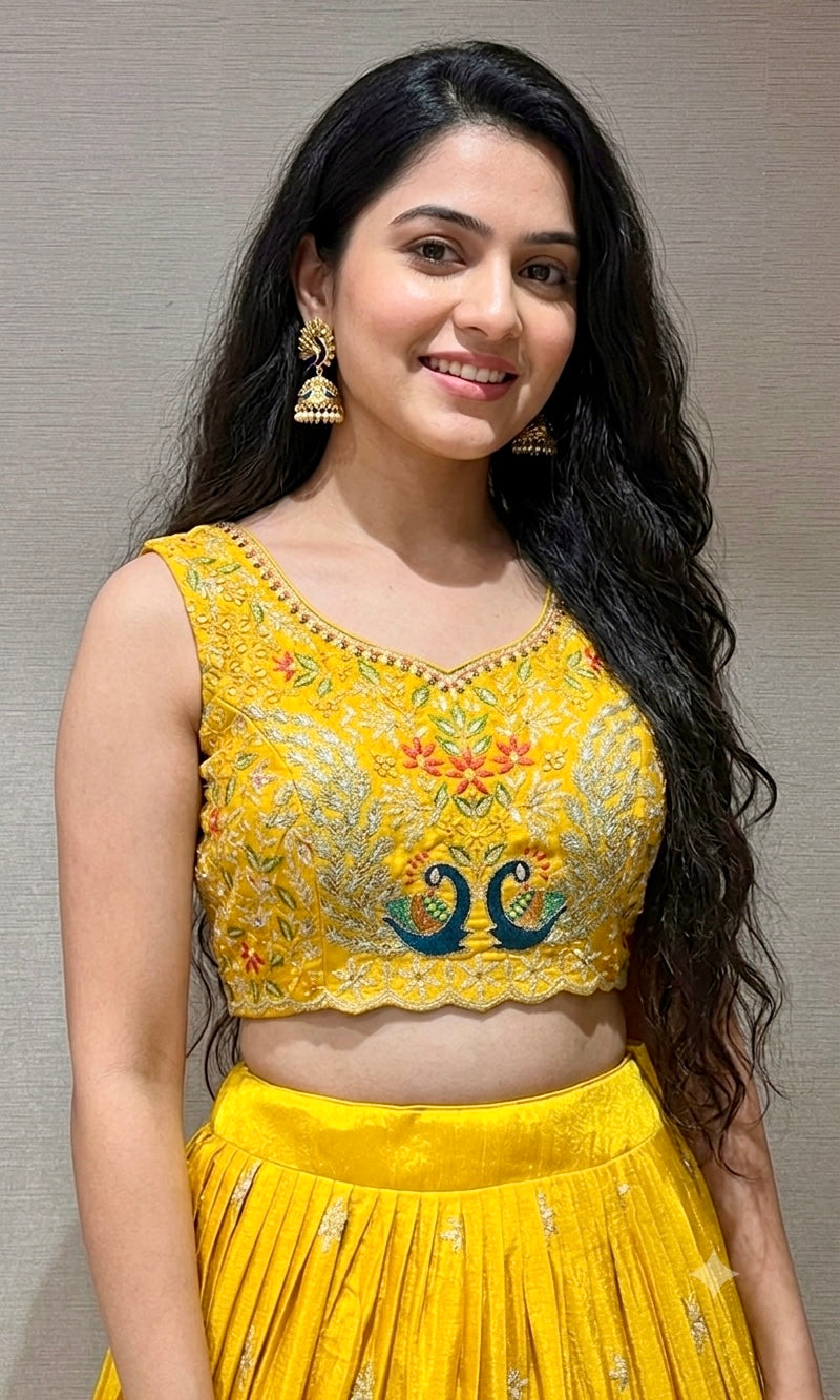 yellow lehenga with peacock design