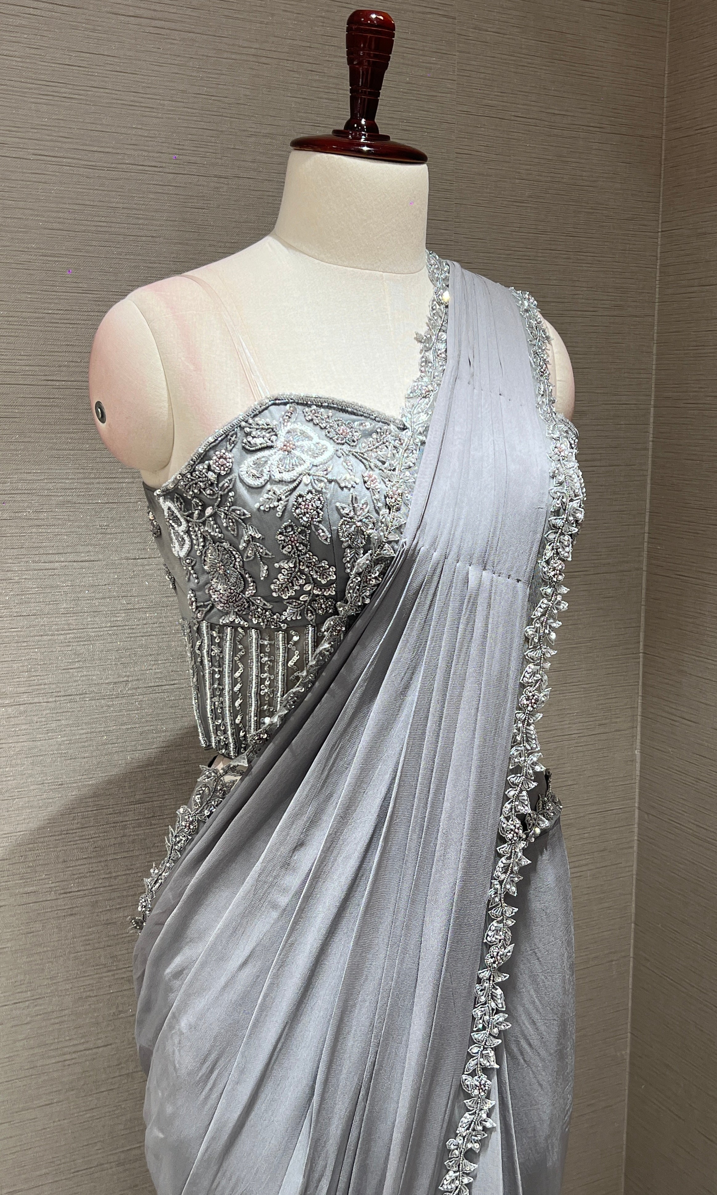 grey drape saree with embroidered corset blouse