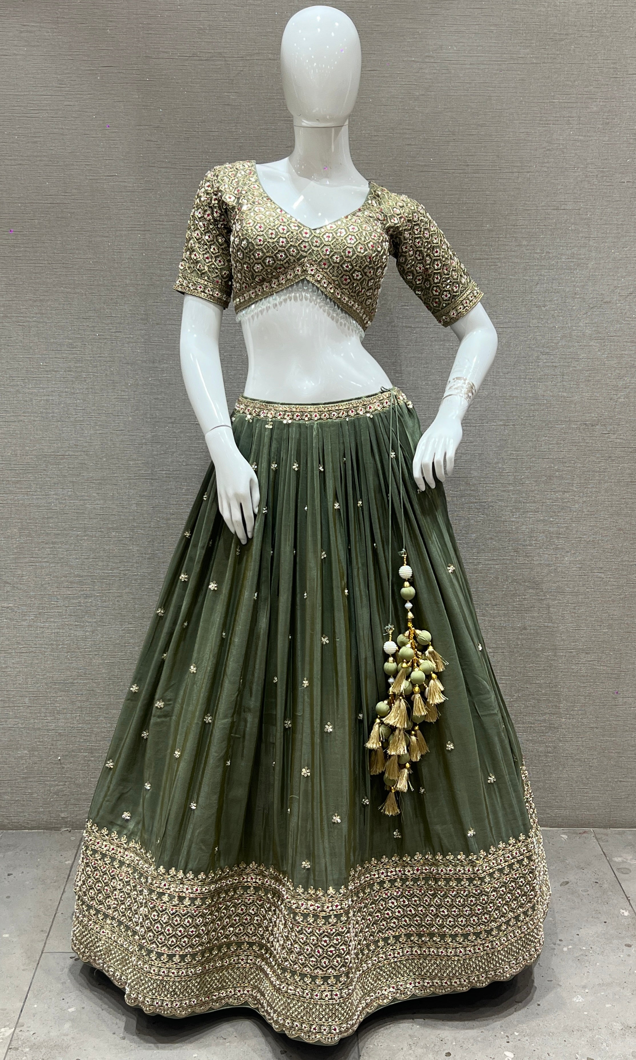 Vanika Sitara - Sage Green Lehenga with Floral & Gold Thread Work Embellishments