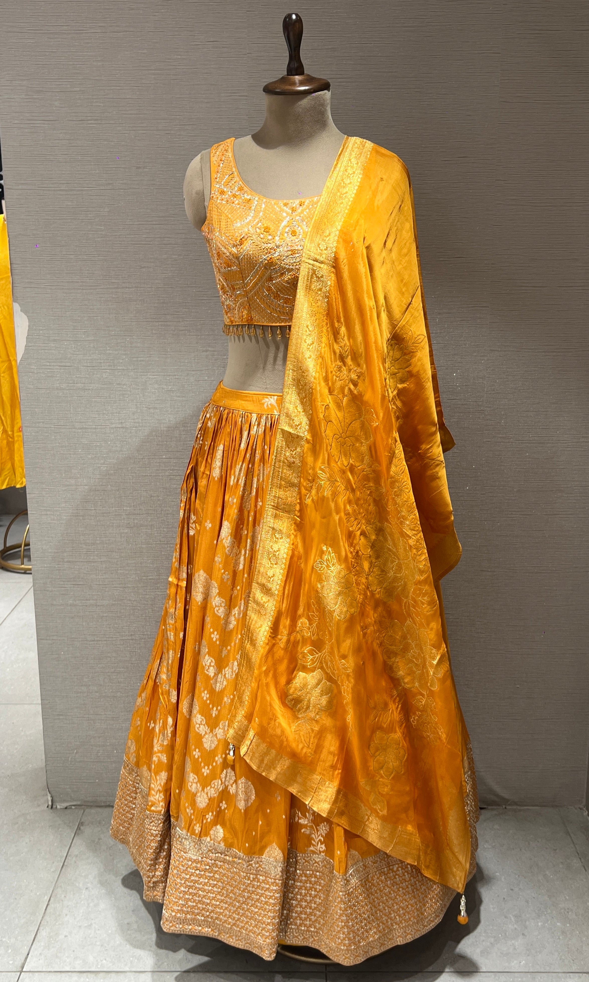 Elegant Yellow Lehenga with sheer dupatta