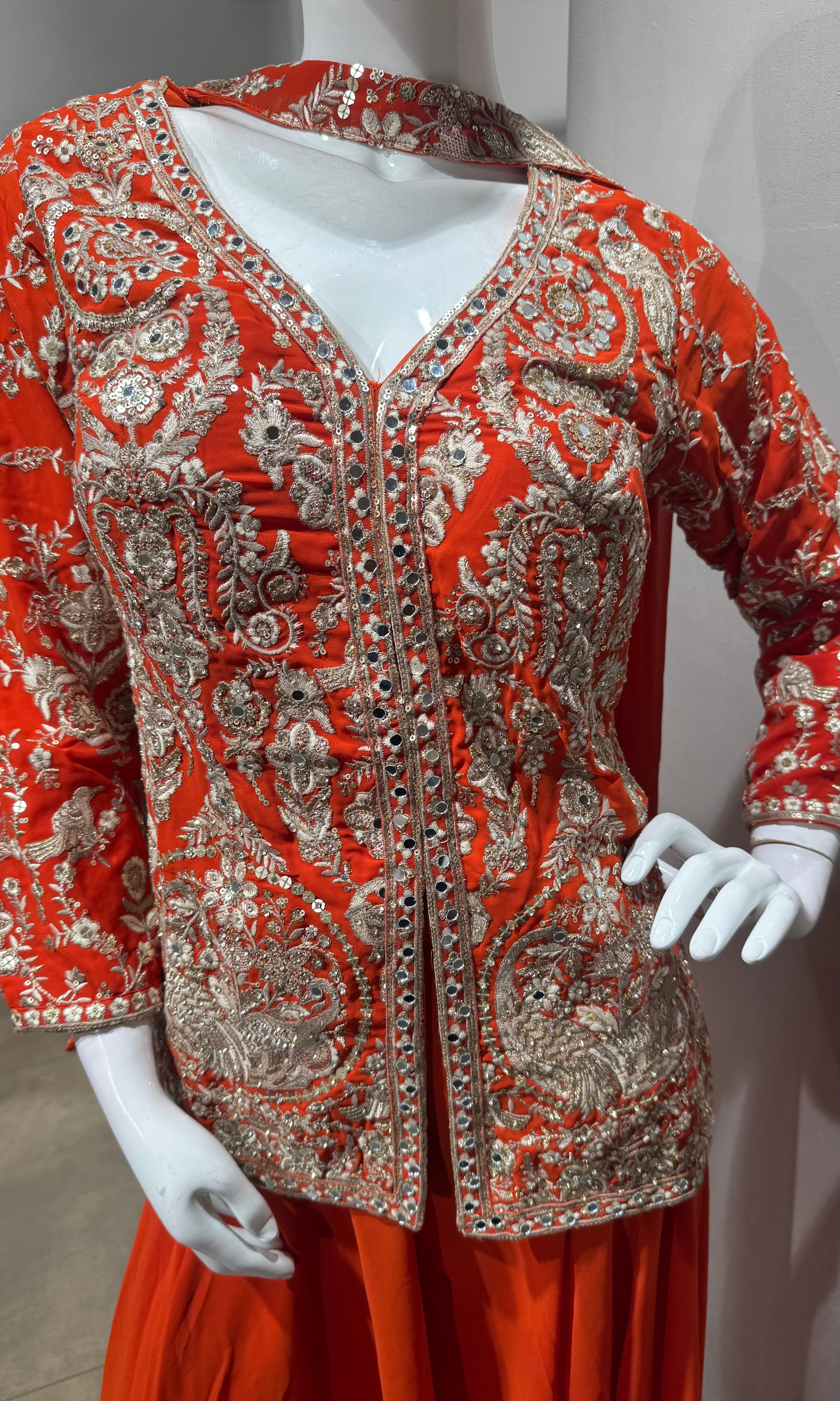 orange and gold embroidered sharara set