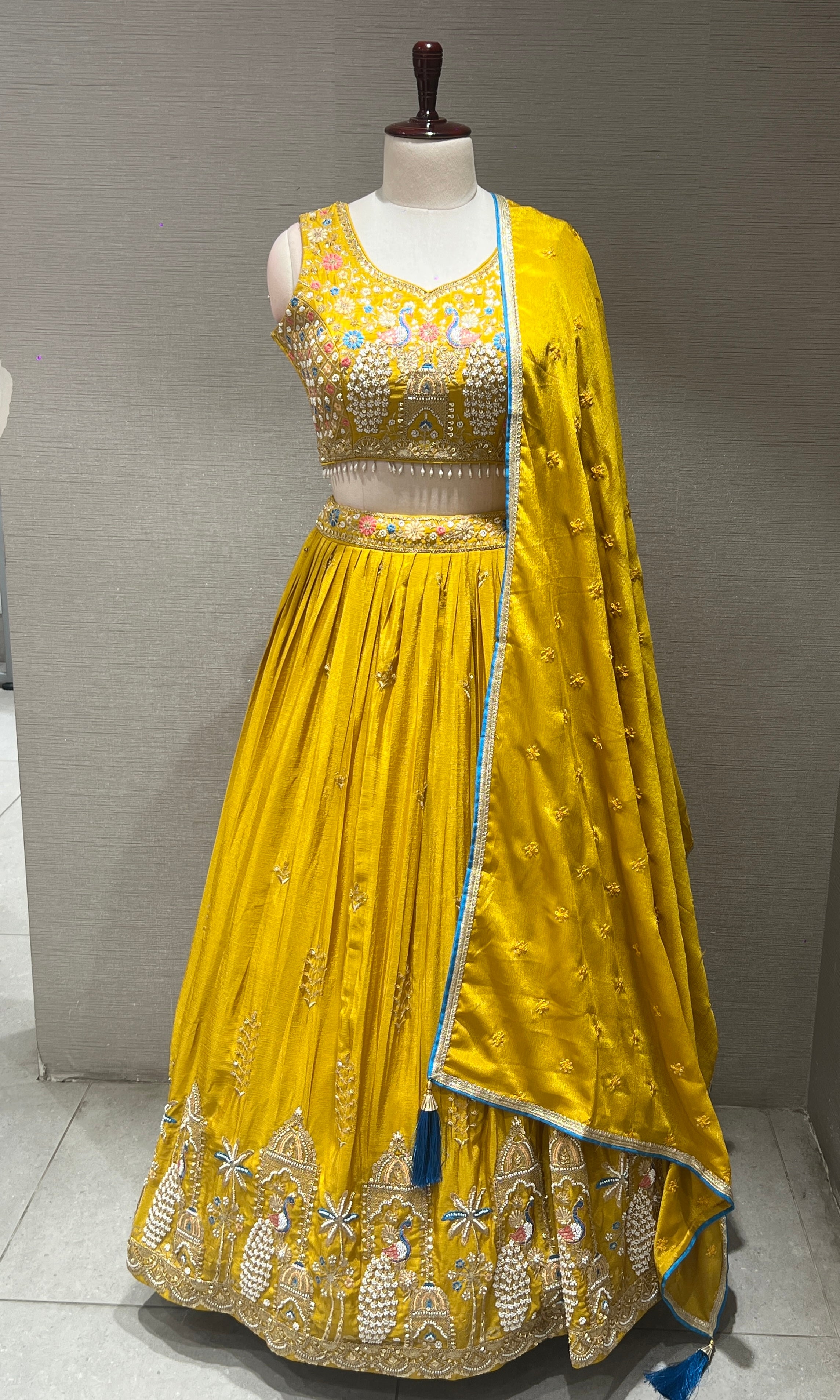 Yellow peacock embroidered Lehenga