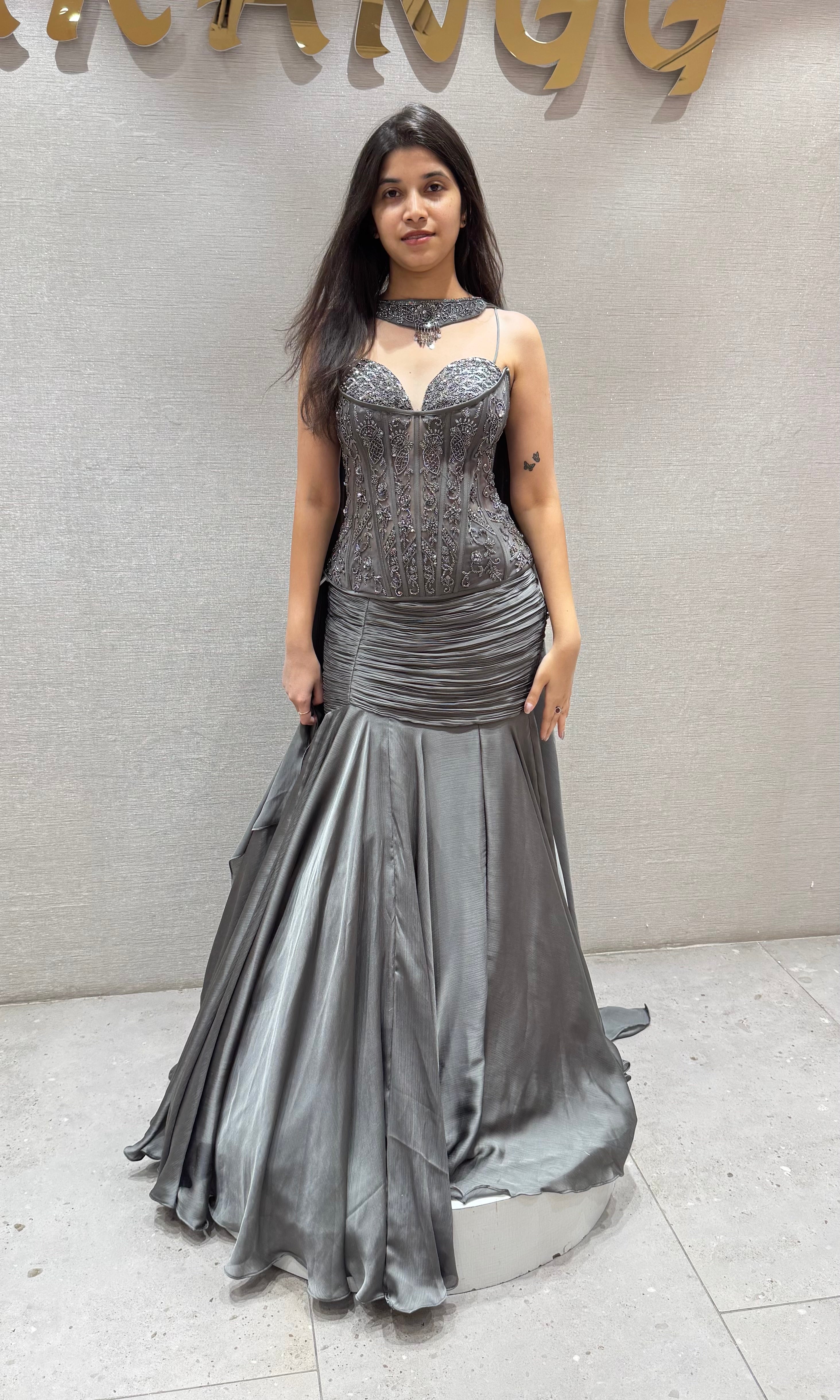 Grey ruffled lehenga with corset blouse