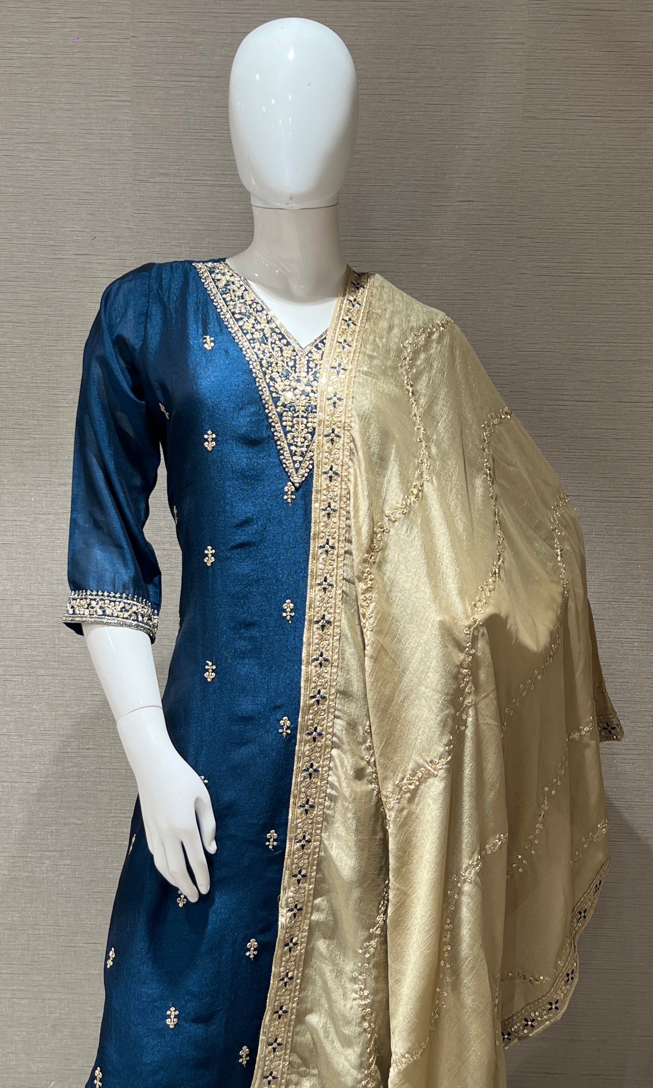 peacock blue kurta set with gold duppatta