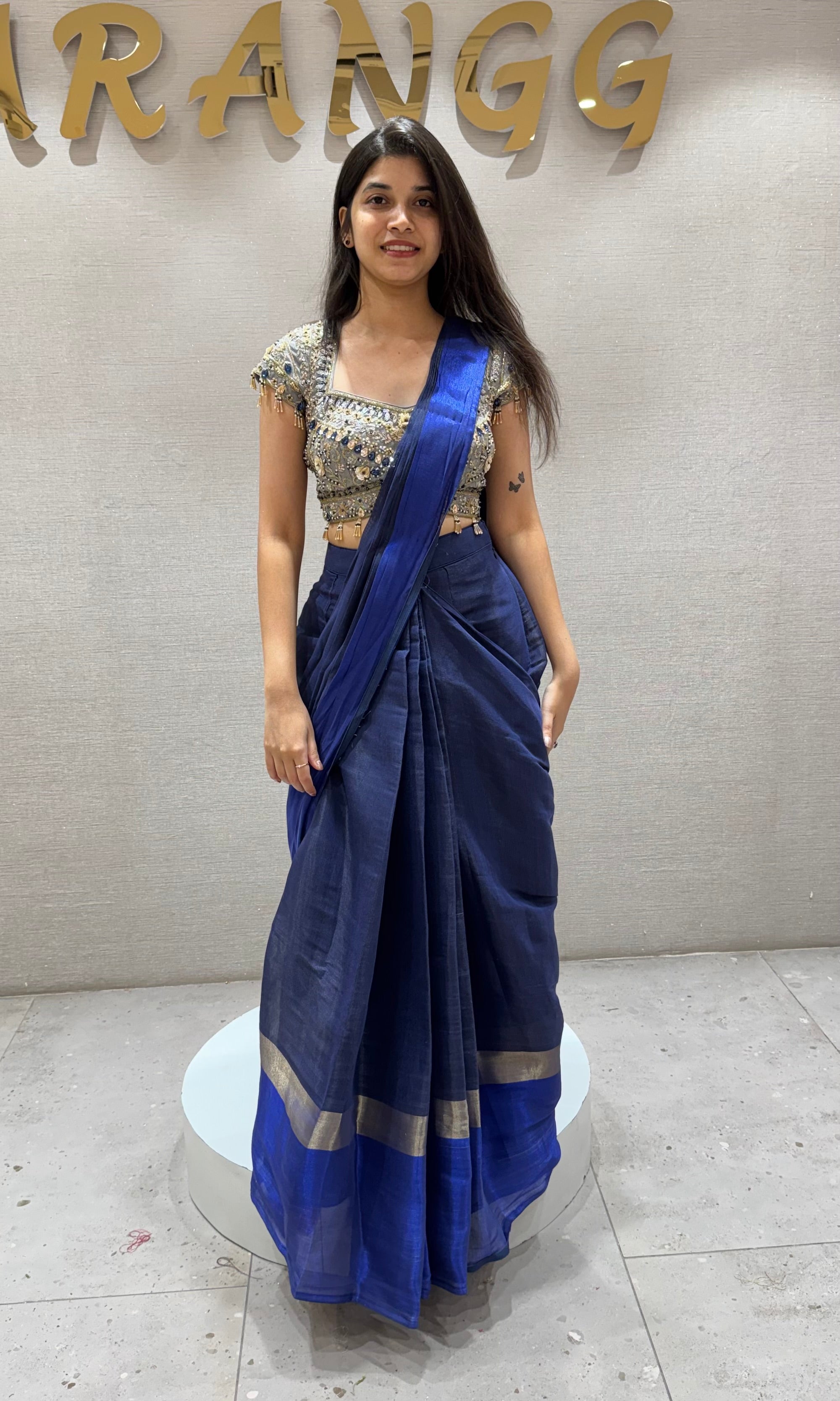 Blue Drape Saree with floral blouse