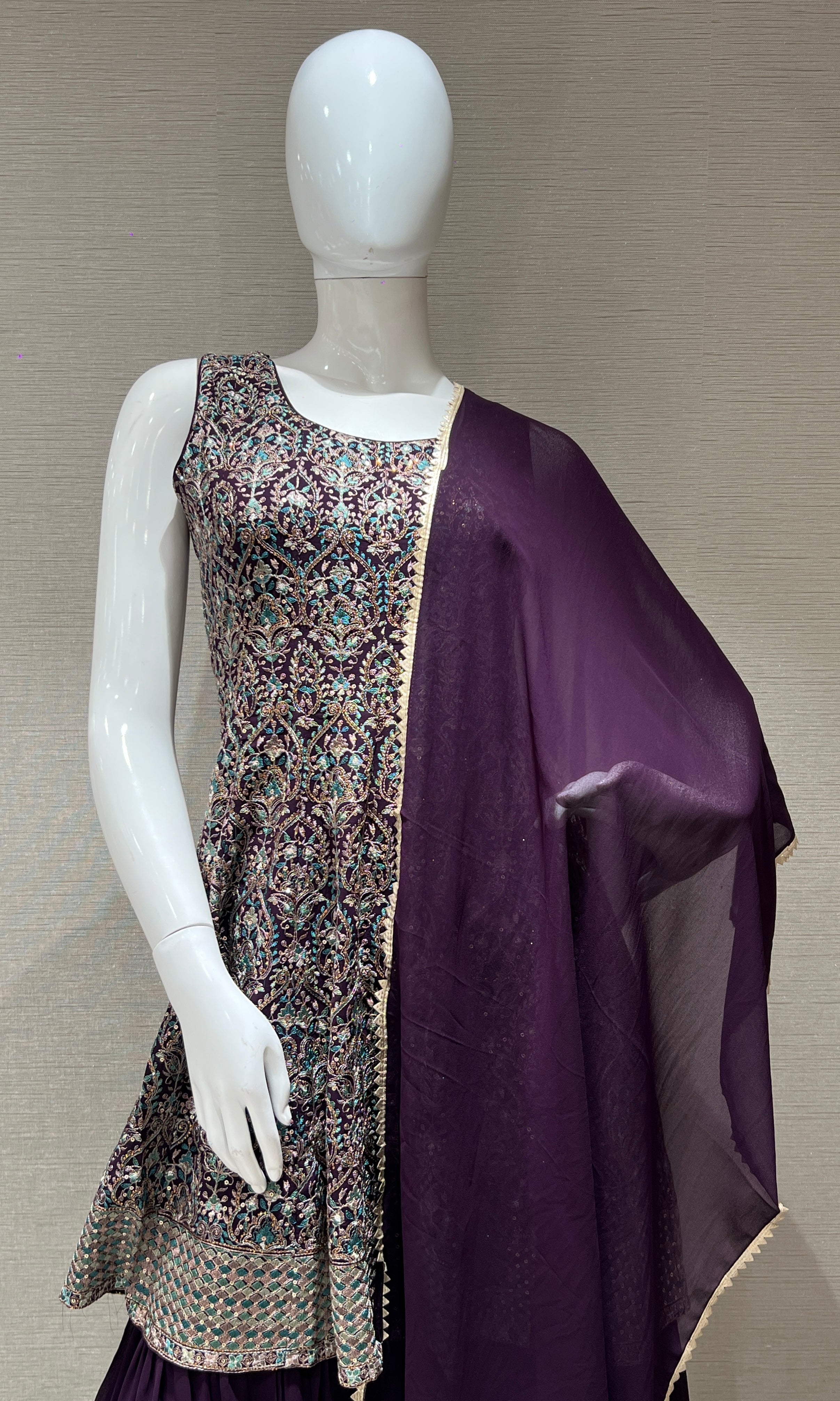 purple sharara with embroidery peplum top