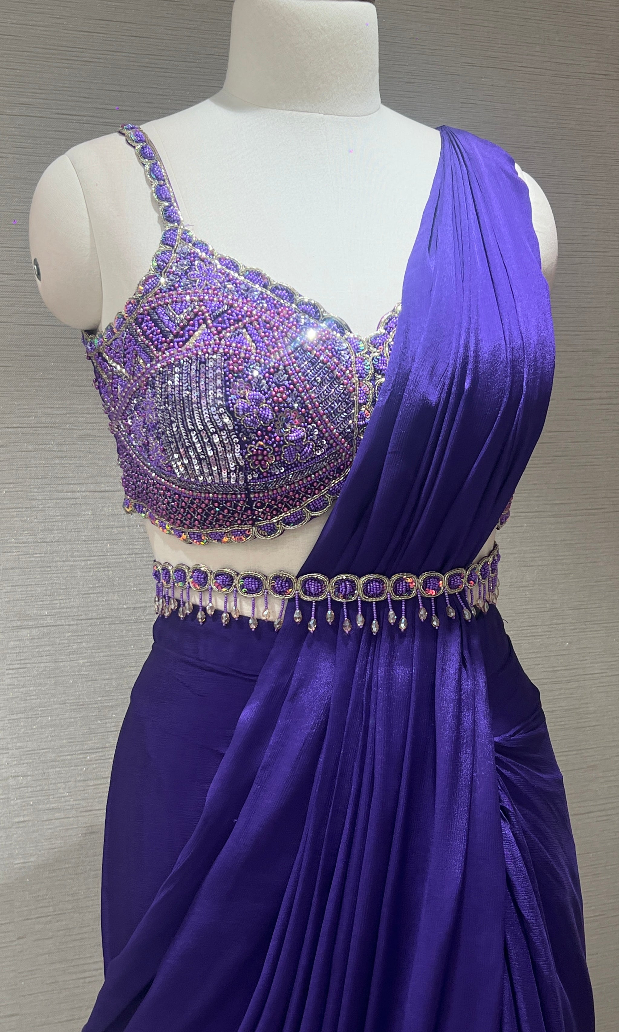 Purple drape saree with embroidered blouse