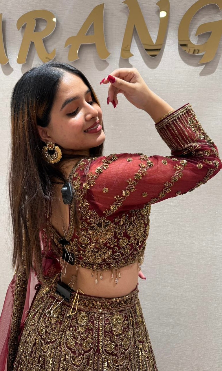 Deep red and gold lehenga