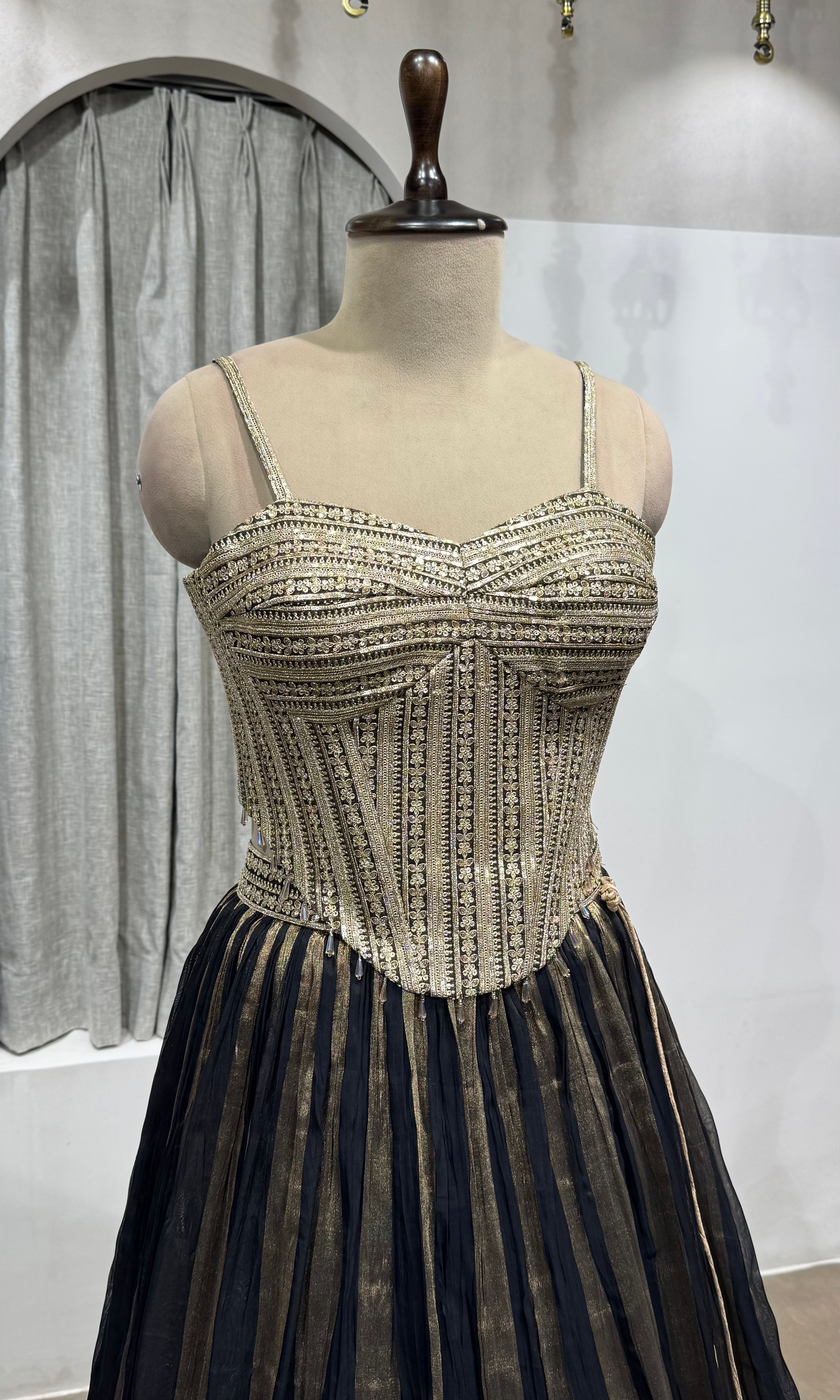black and gold striped corset lehenga