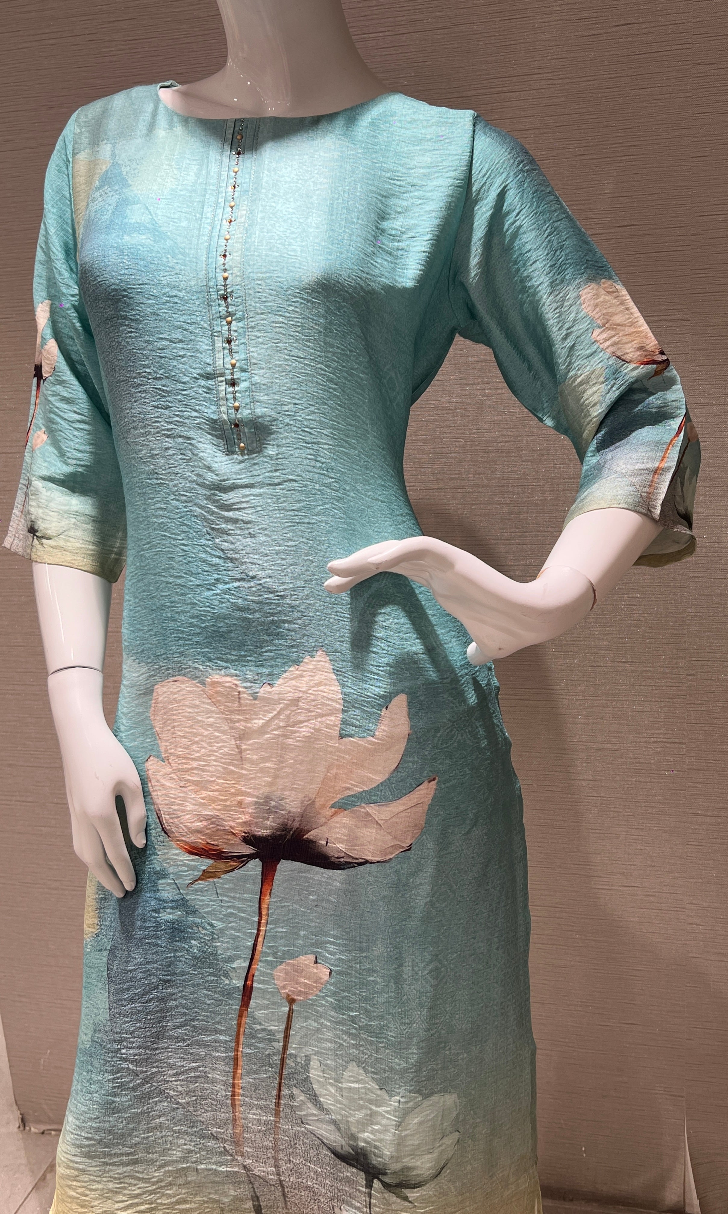 Sea blue kurti top with a floral print