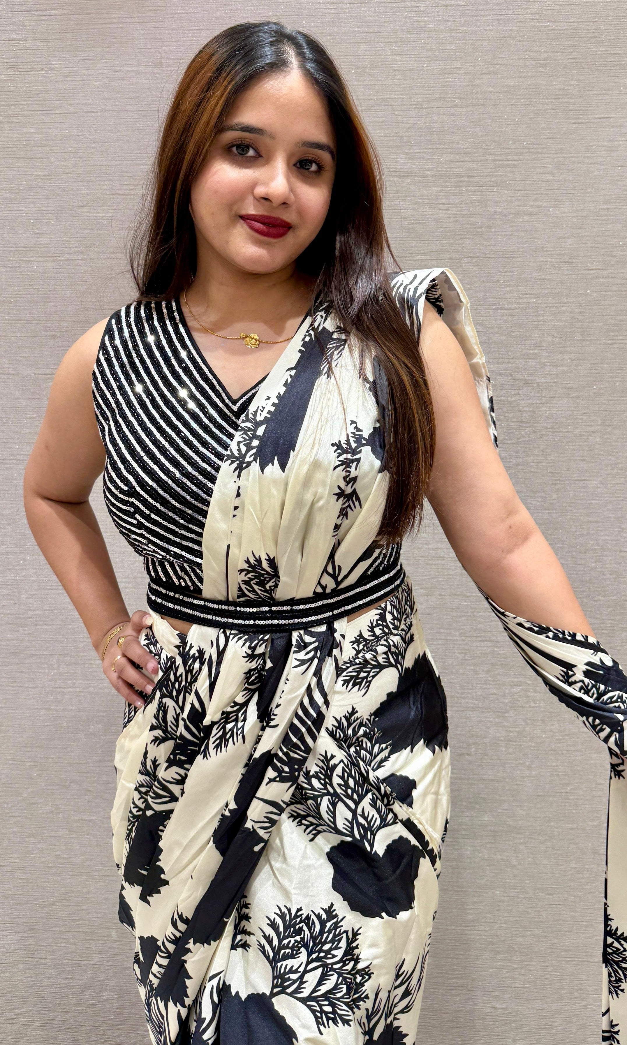 Black Floral drape saree with sequined blouse